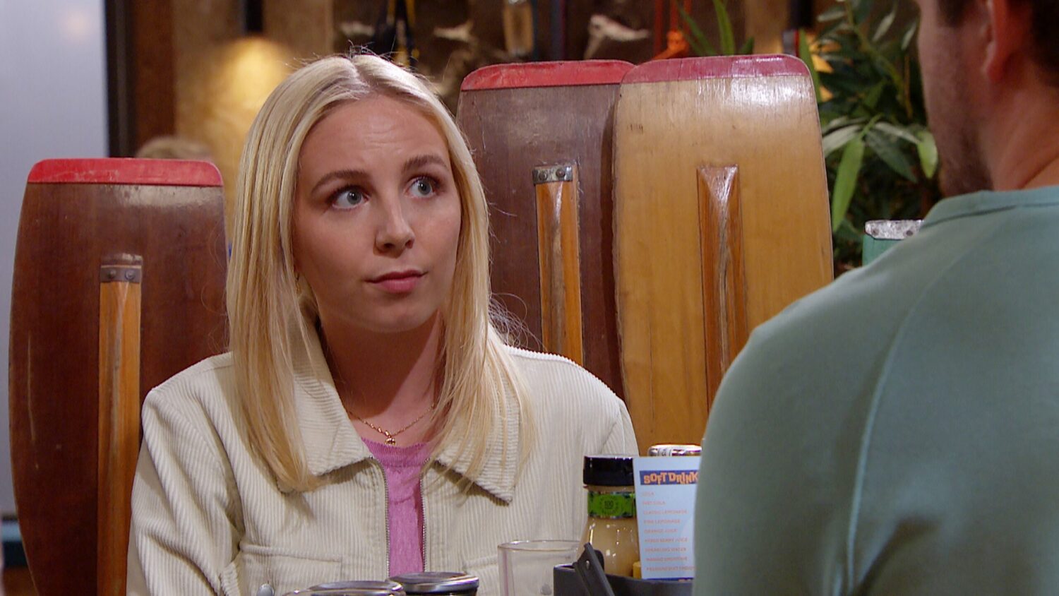 Belle looks annoyed at Tom in Emmerdale