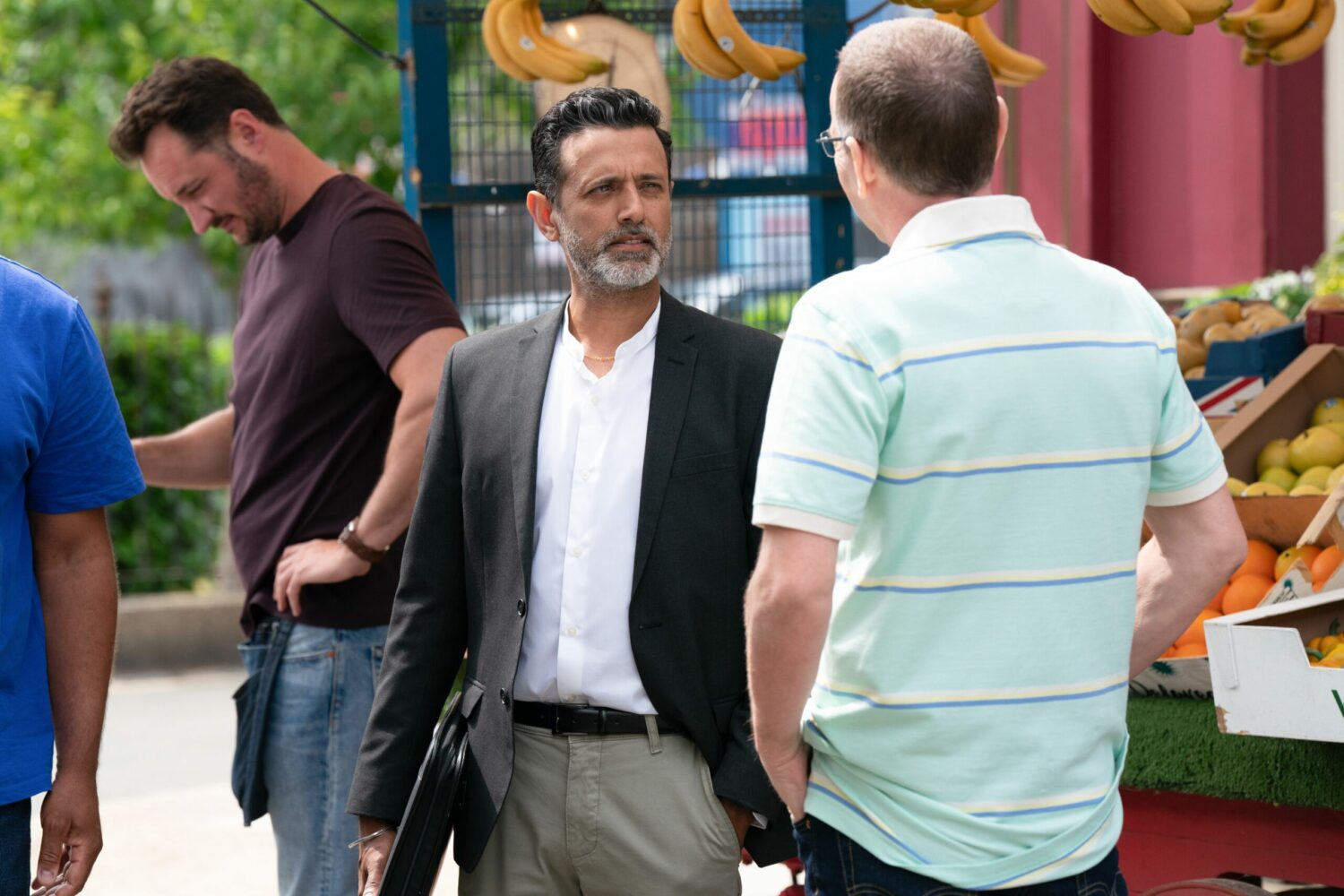 Nish and Ian talk in the Square