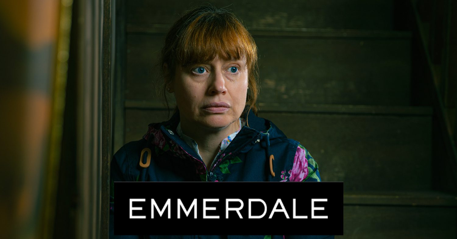 Emmerdale's Lydia is sitting on the stairs in shock, and the Emmerdale logo