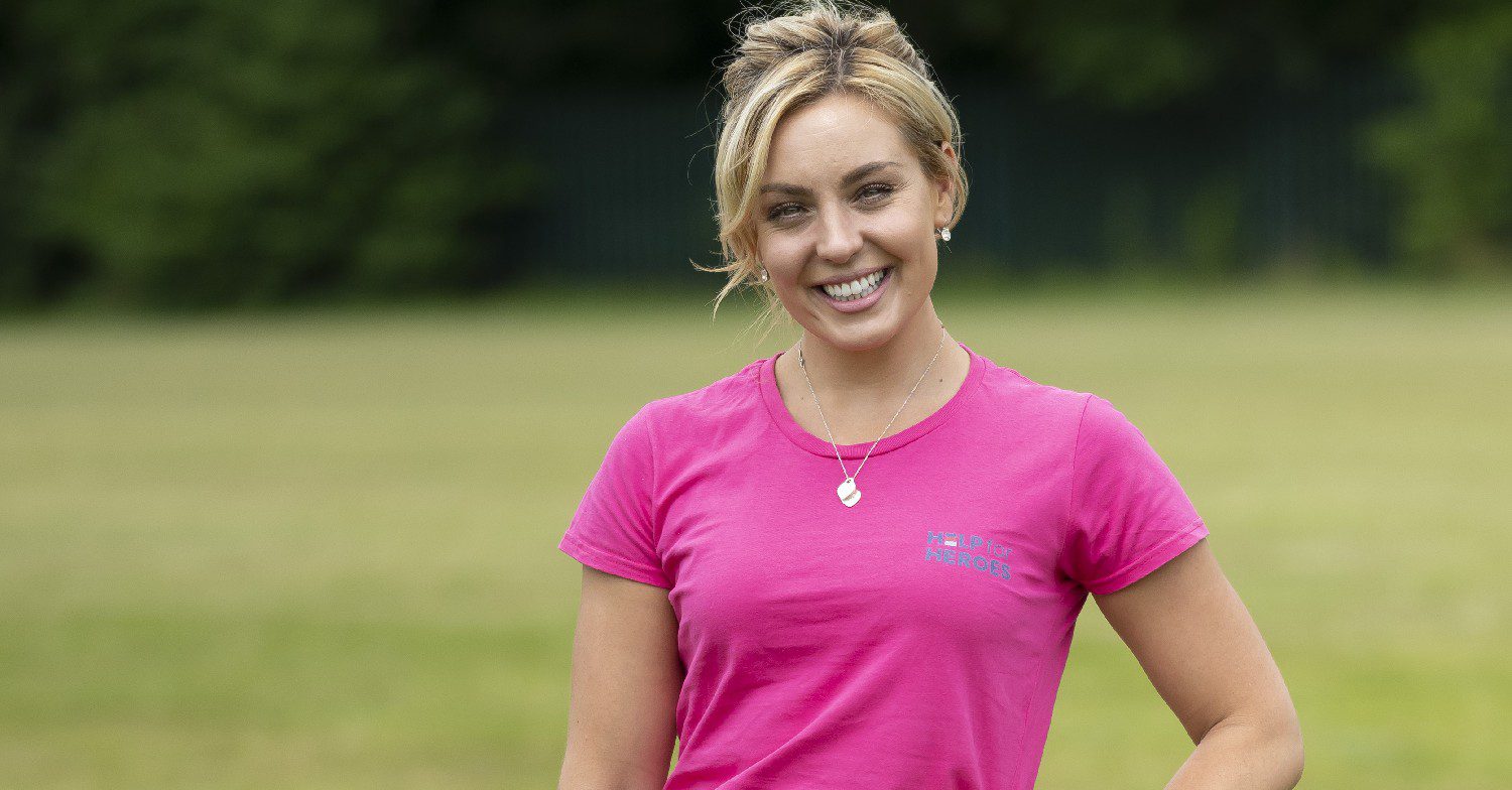 Dancer Amy Dowden in a pink T-shirt smiling as she models for For Help For Heroes