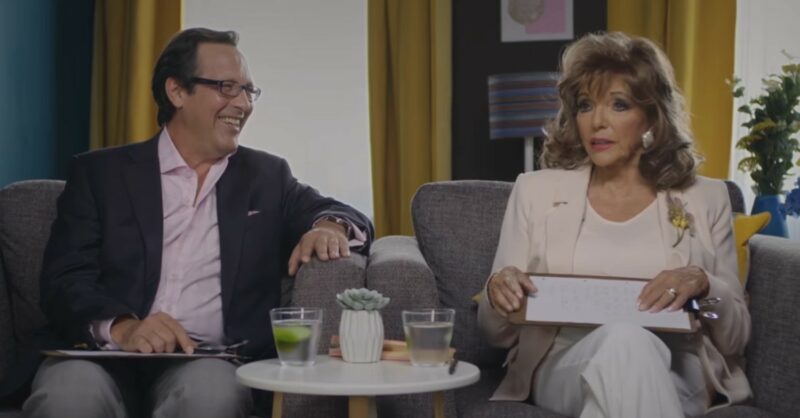 Joan Collins sitting with husband Percy