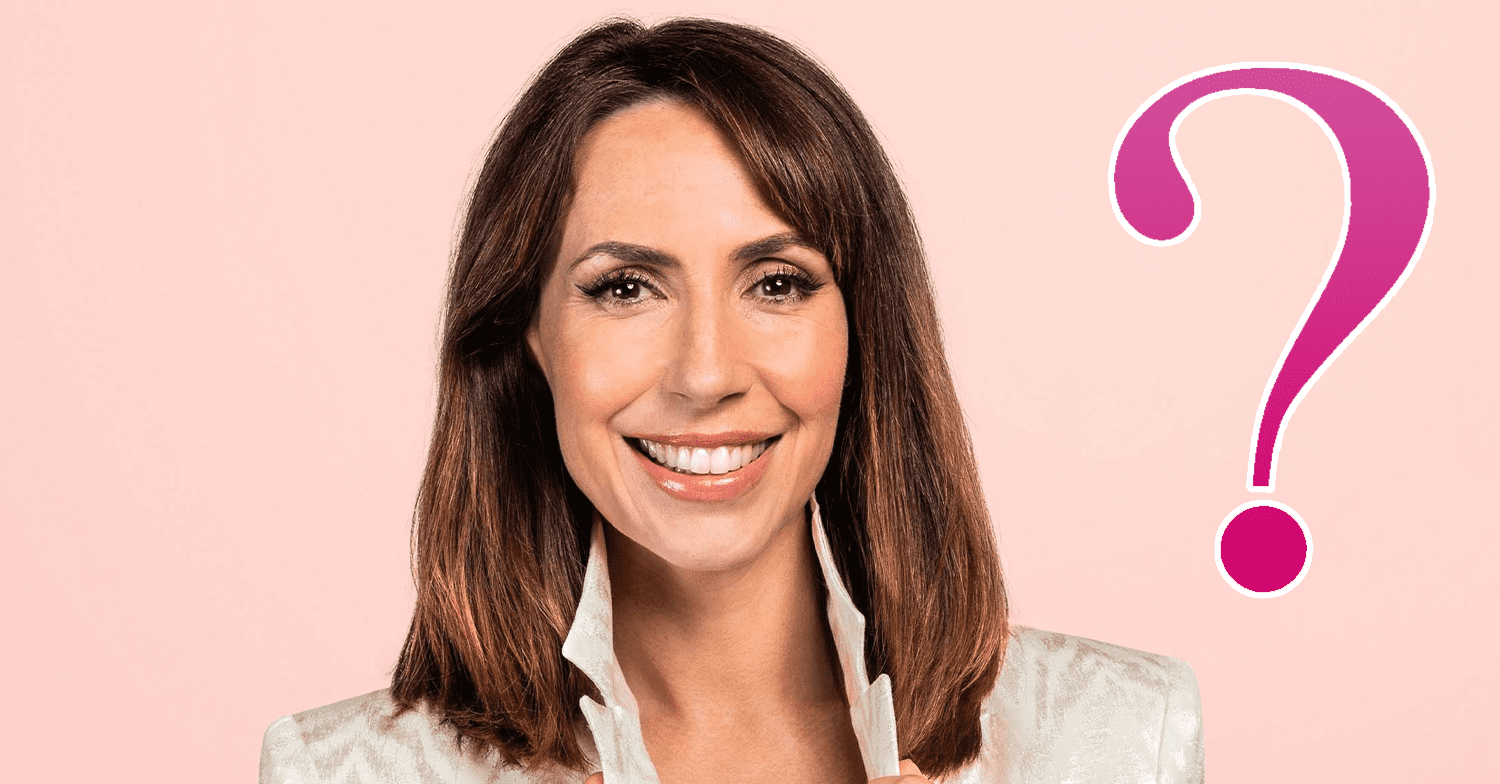 Alex Jones smiling on a pink background