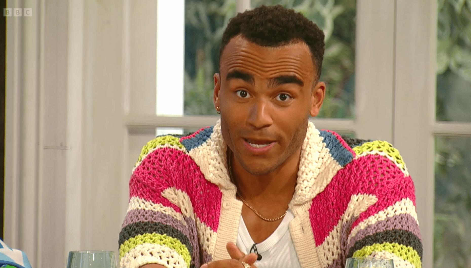 Munya Chawawa on Saturday Kitchen in a bright knitted cardigan