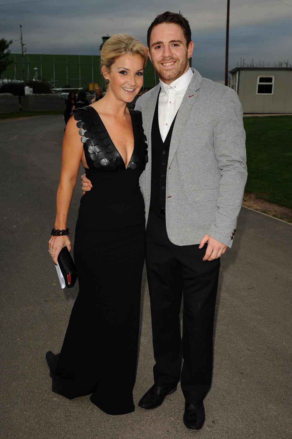 Helen Skelton and Richie Myler smile as they pose for photographs together