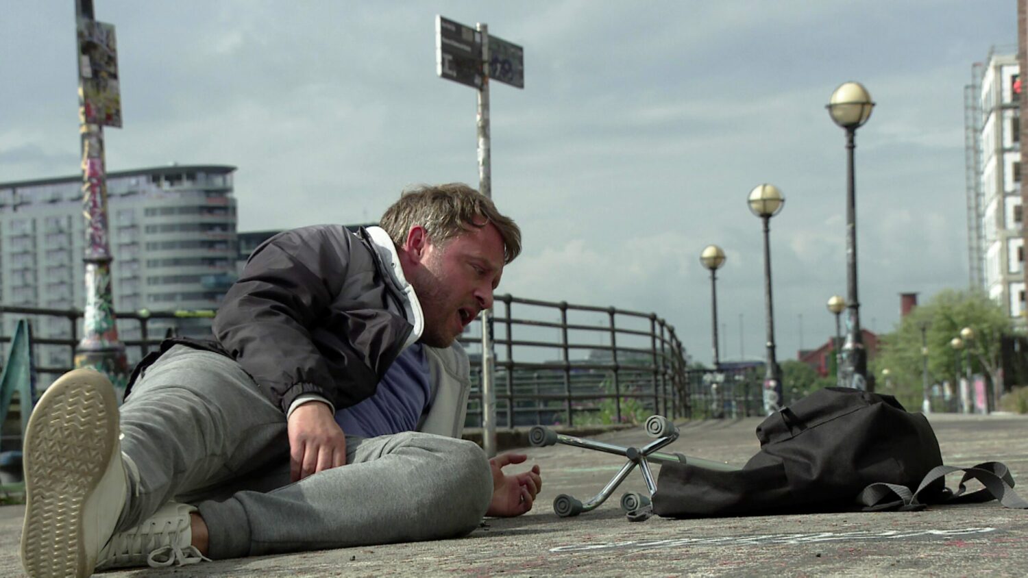Paul lying on the ground helpless in Corrie
