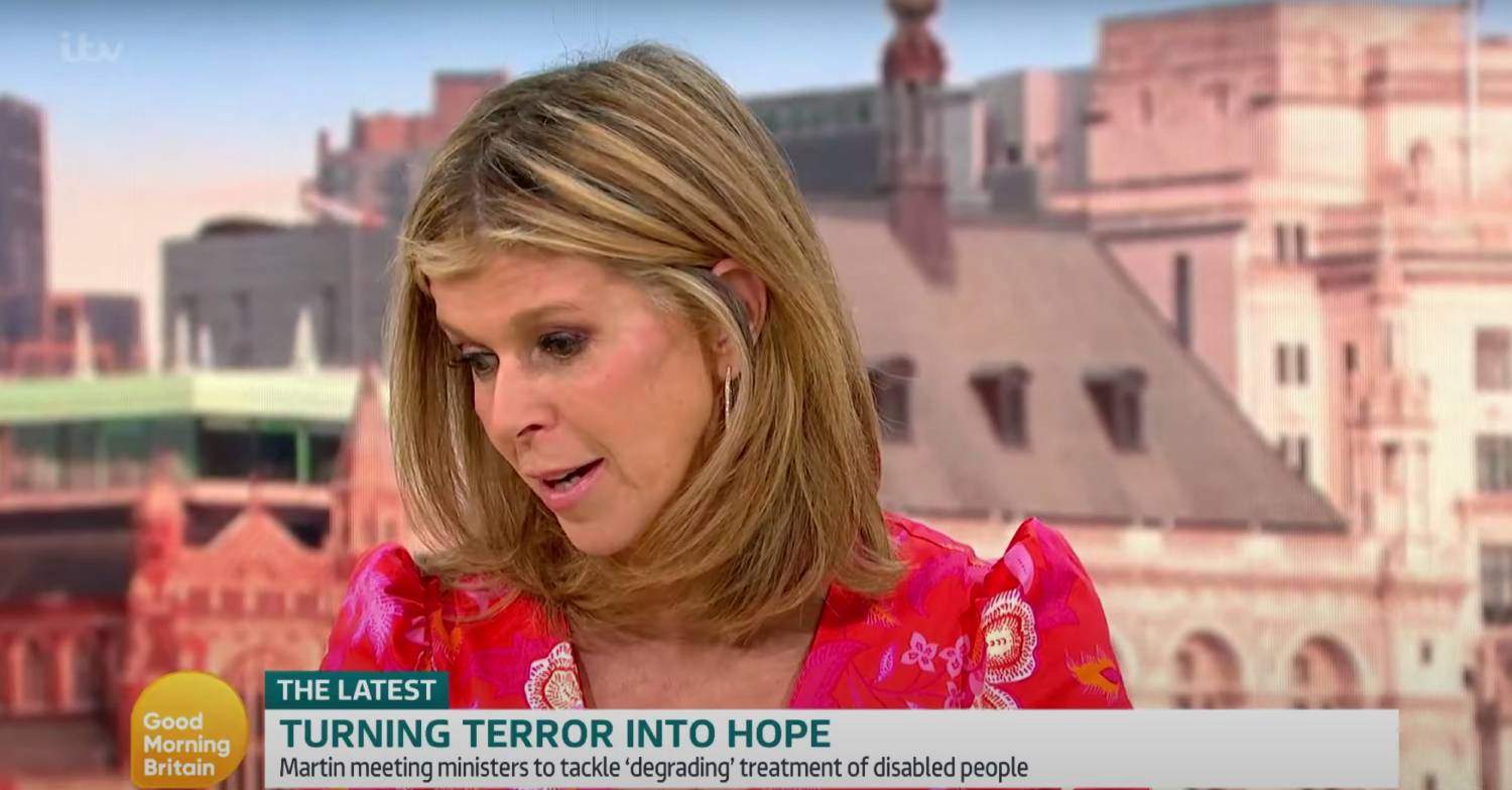 Kate Garraway looks downwards