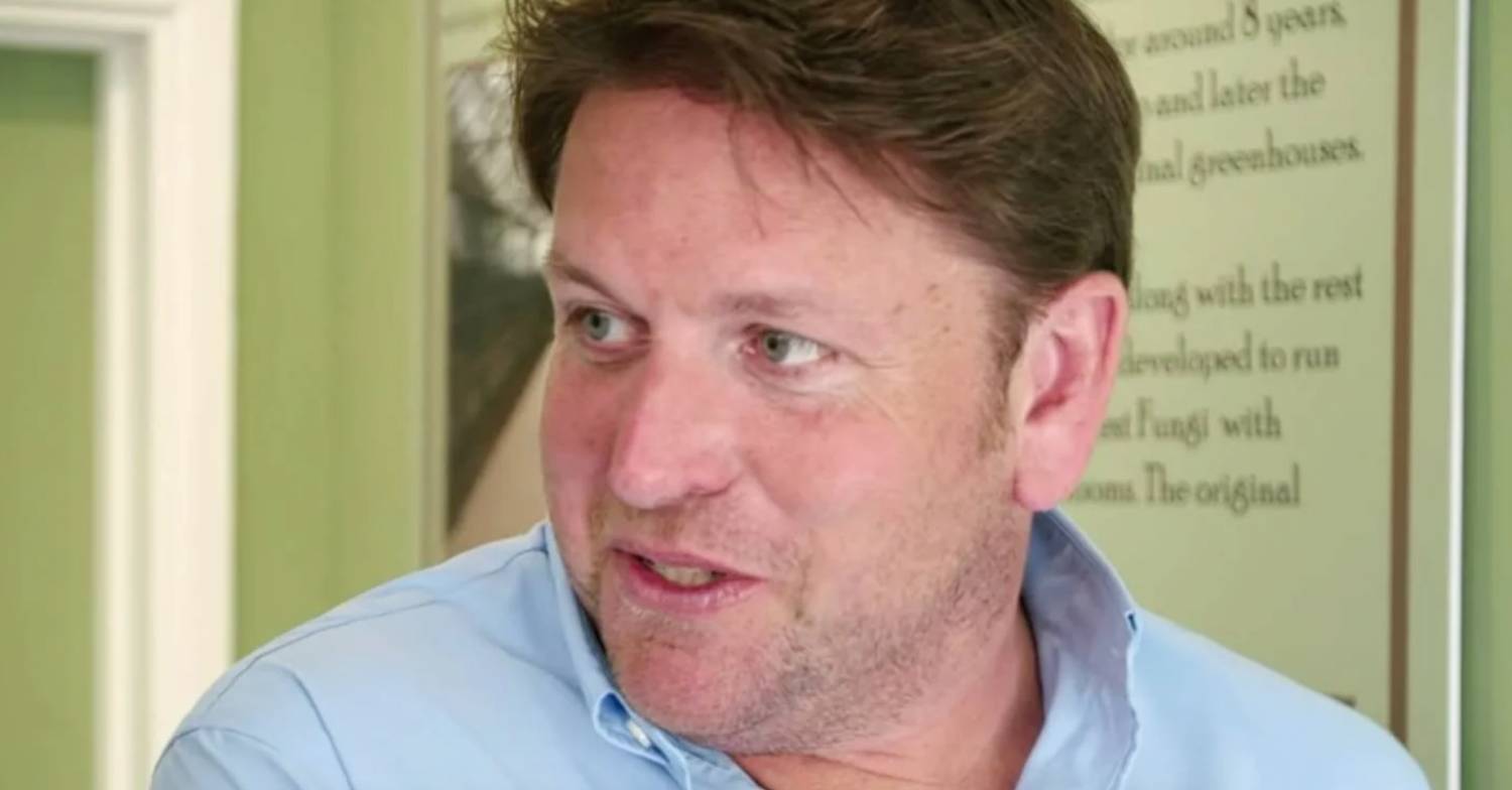 James Martin looks to his side