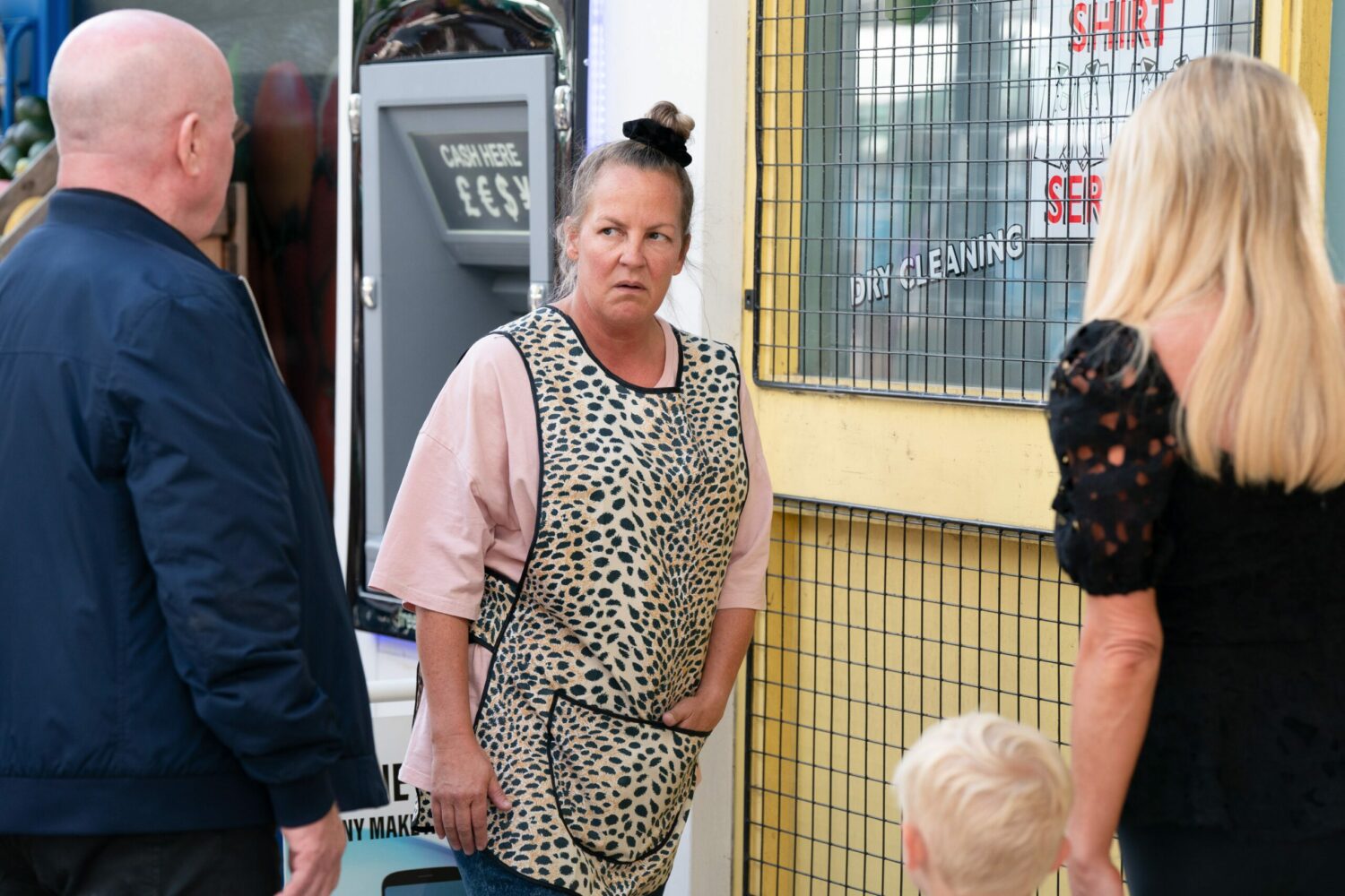 EastEnders' Phil, Karen, Sharon and Albie are outside of the laundrette