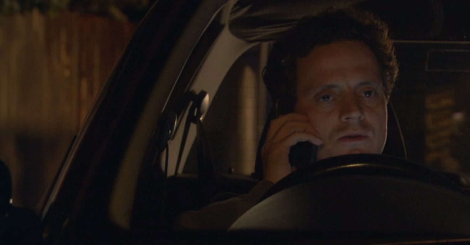 EastEnders' Theo is on the phone in his car