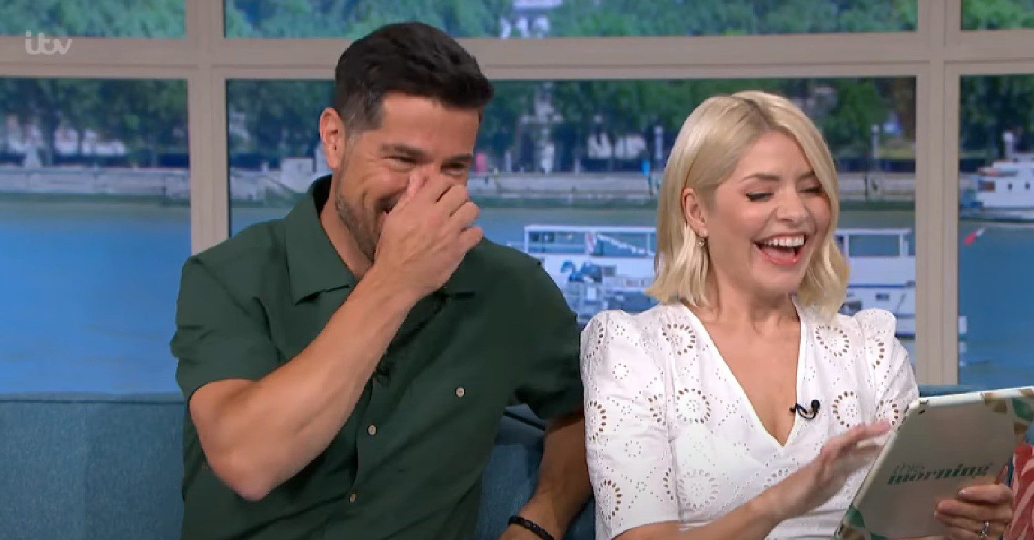 Craig Doyle laughing as Holly Willoughby smiles on This Morning