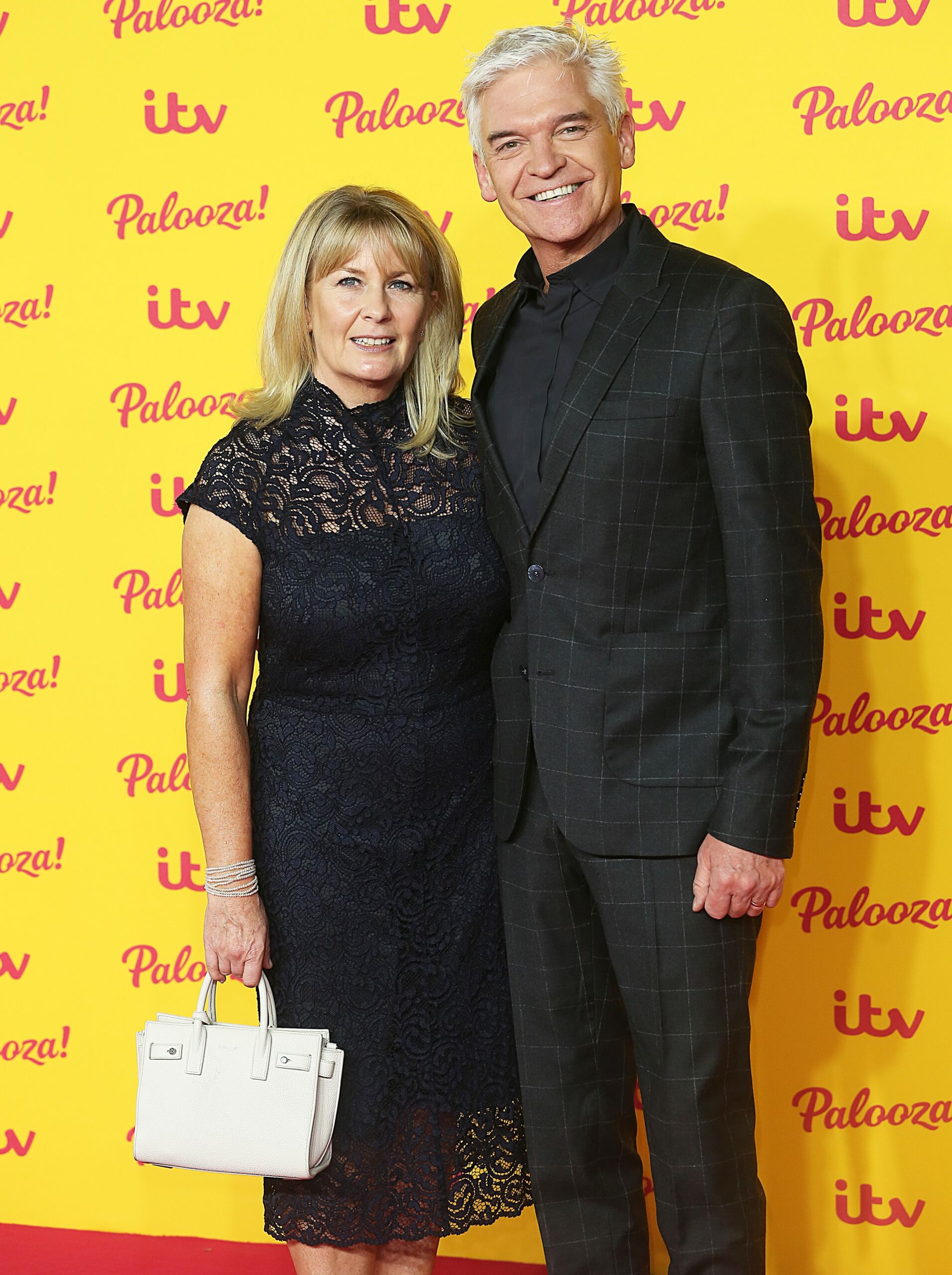 Phillip Schofield smiling with estranged wife Steph