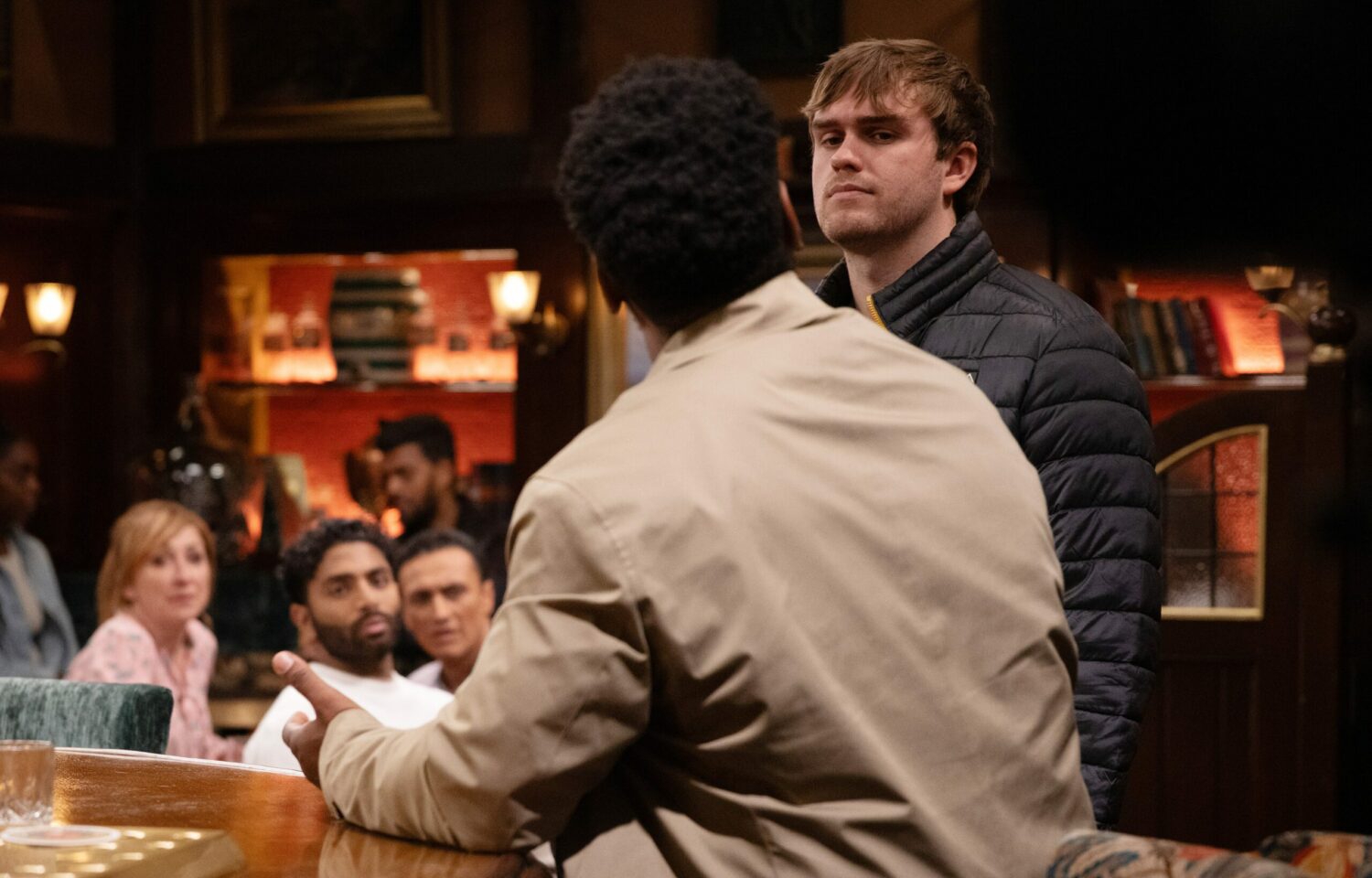 Tom tries to talk to Charles in the Woolpack