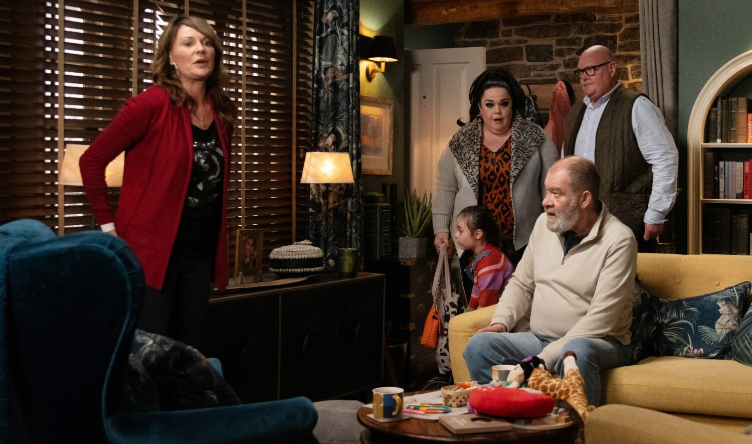 Chas looks uncomfortable as Mandy, Paddy, Bear and Eve watch on