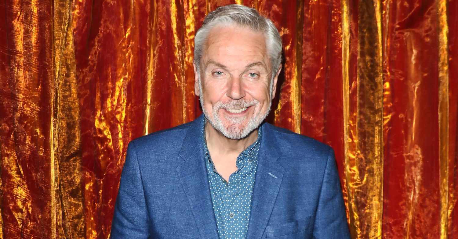 EastEnders' Brian Conley is smiling at an event