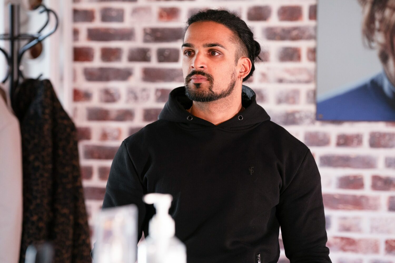 Ravi looks upset and angry in EastEnders
