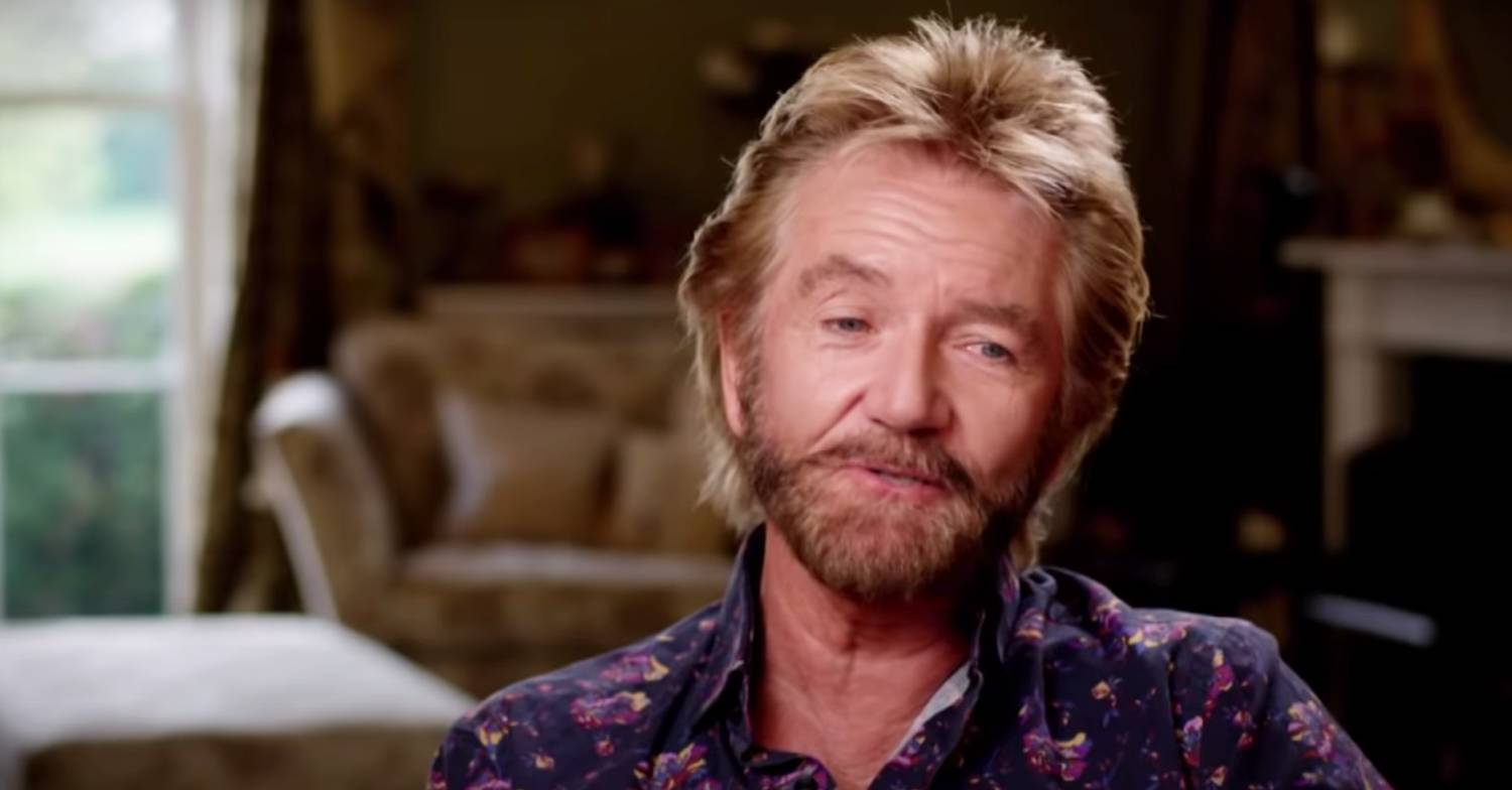 Noel Edmonds looks to his side