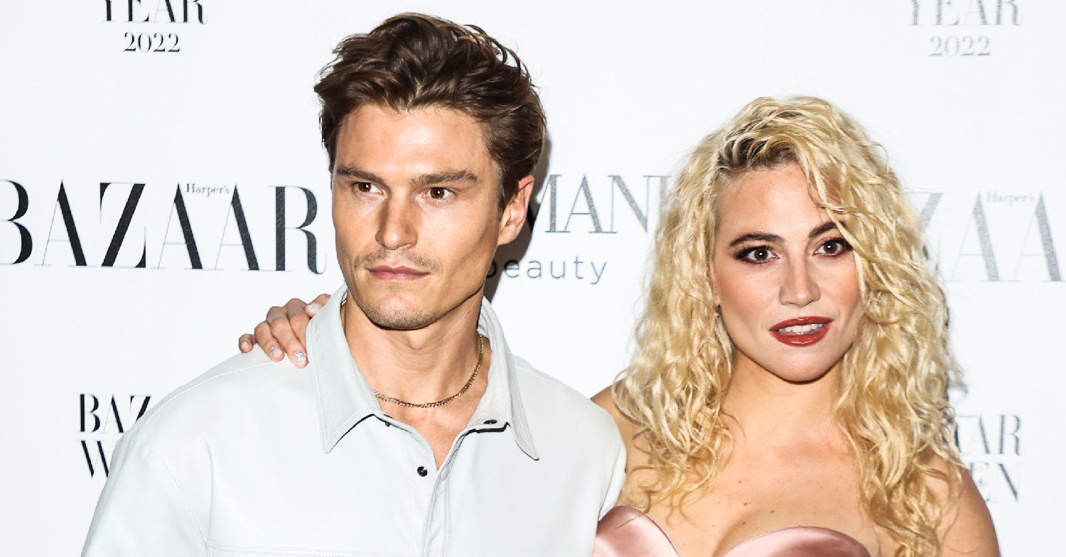 Oliver and Pixie Lott posing