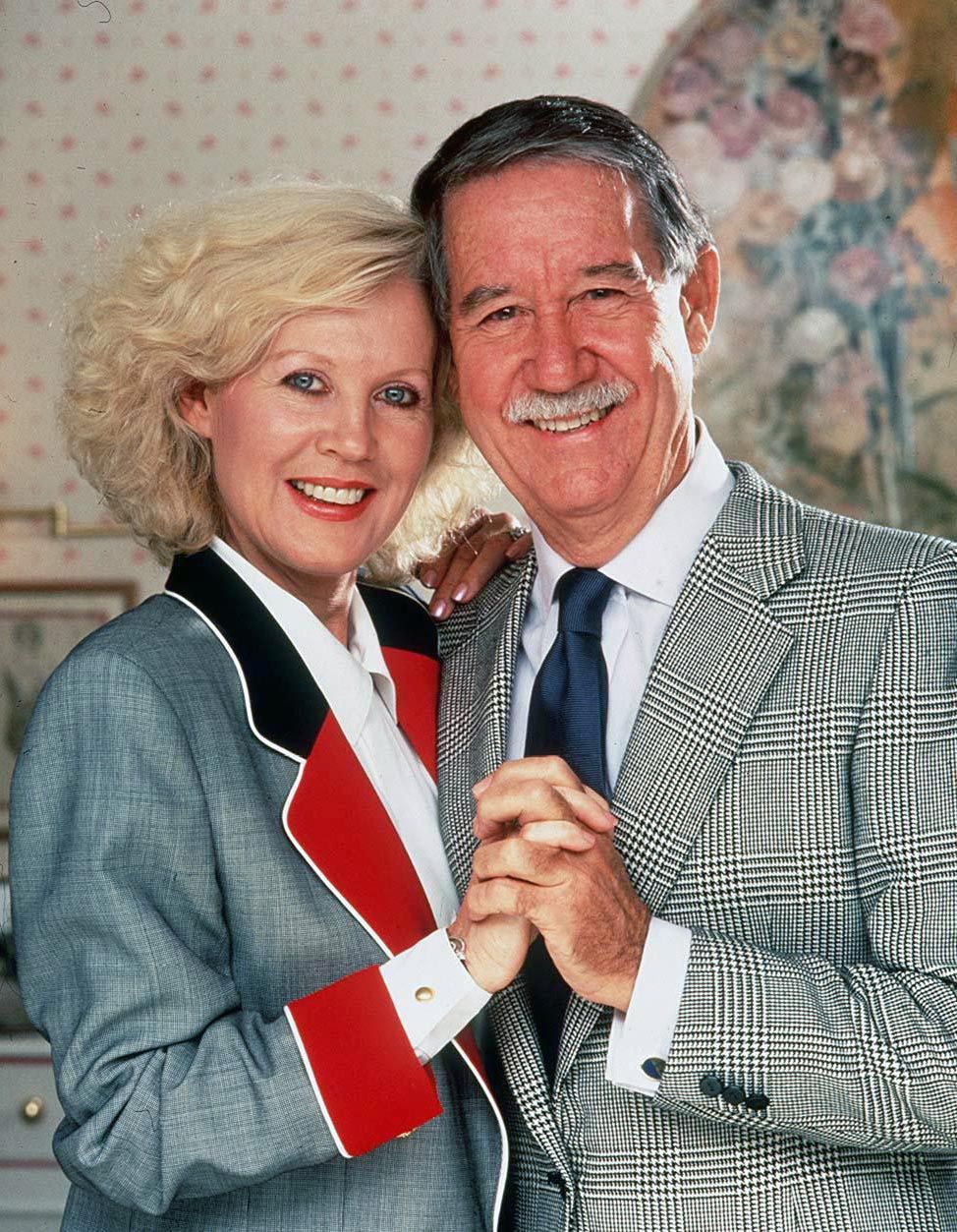 Joy Chambers-Grundy and husband Reg cuddle and pose together