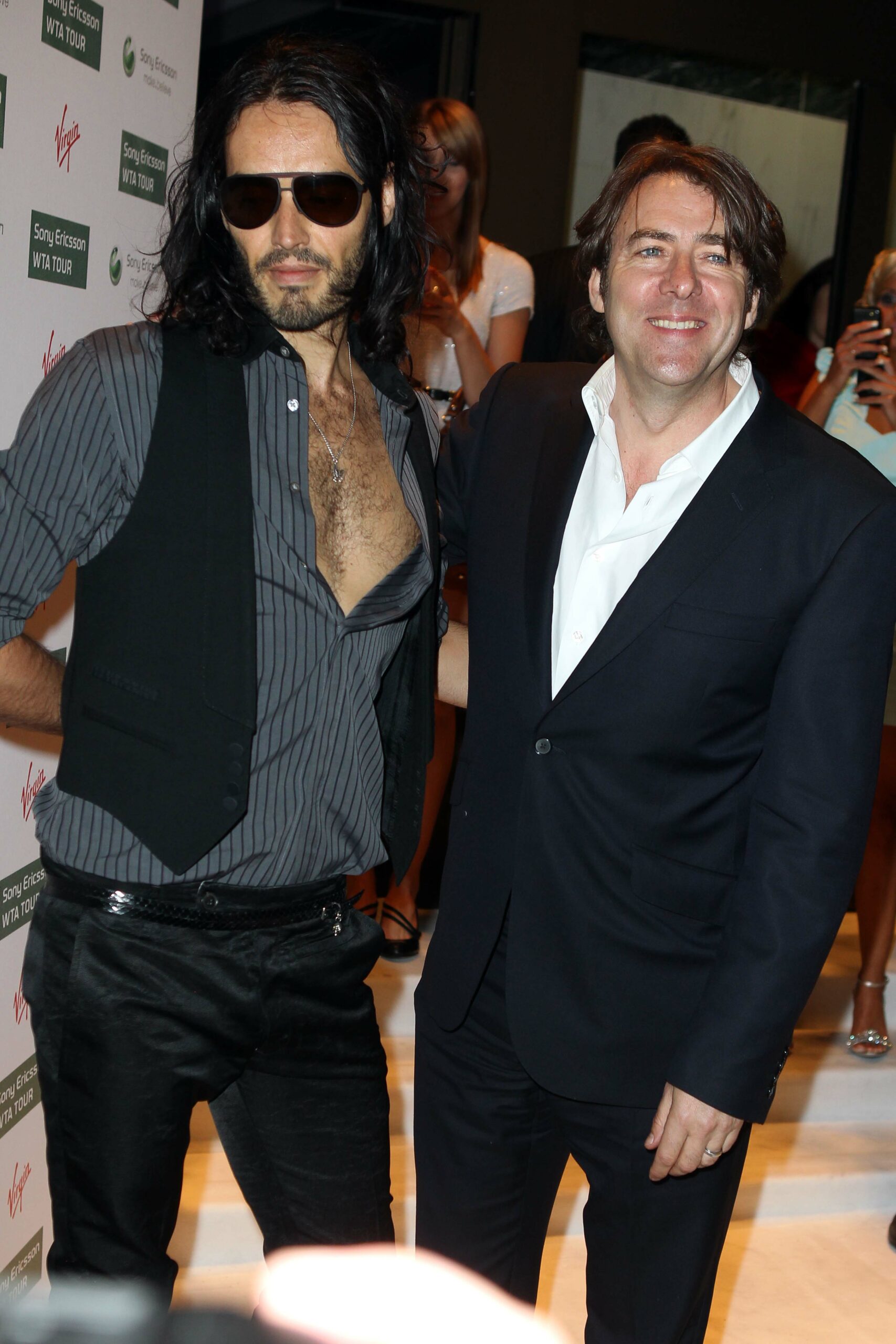 Russell Brand and Jonathan Ross smile together 