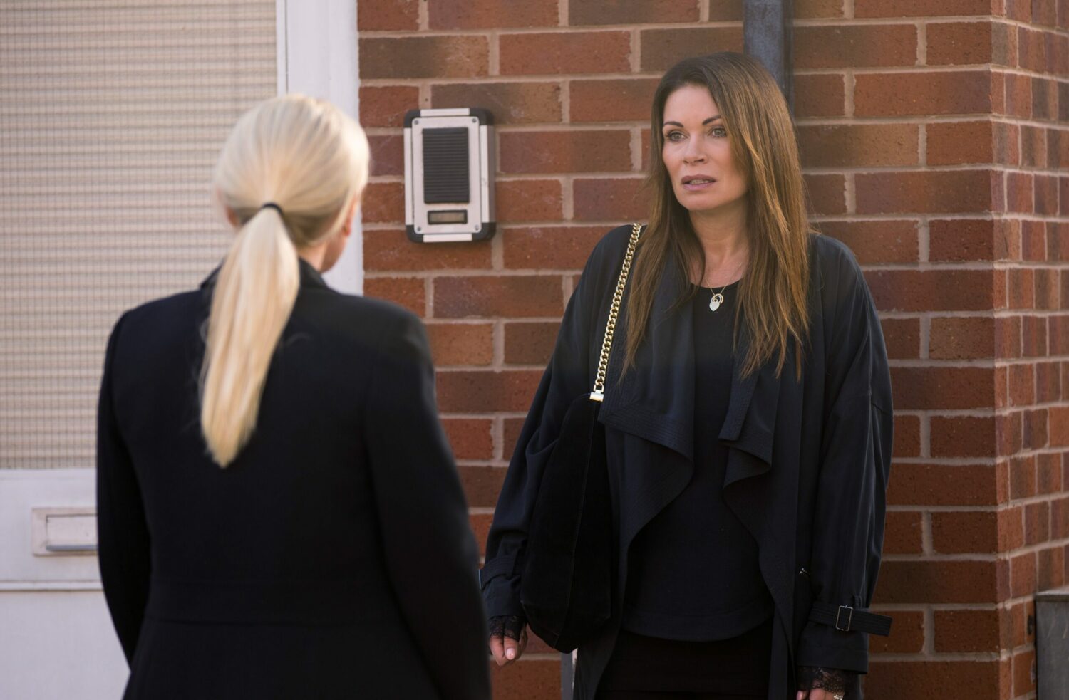 Coronation Street's Carla is talking to DS Swain outside