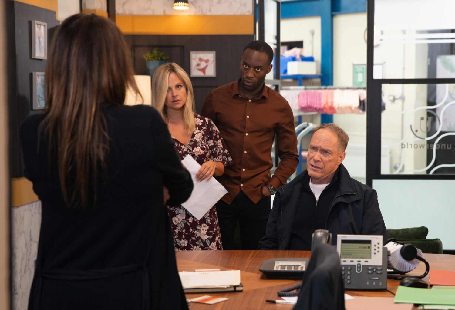 Stephen talking to Carla, Michael and Sarah in the factory