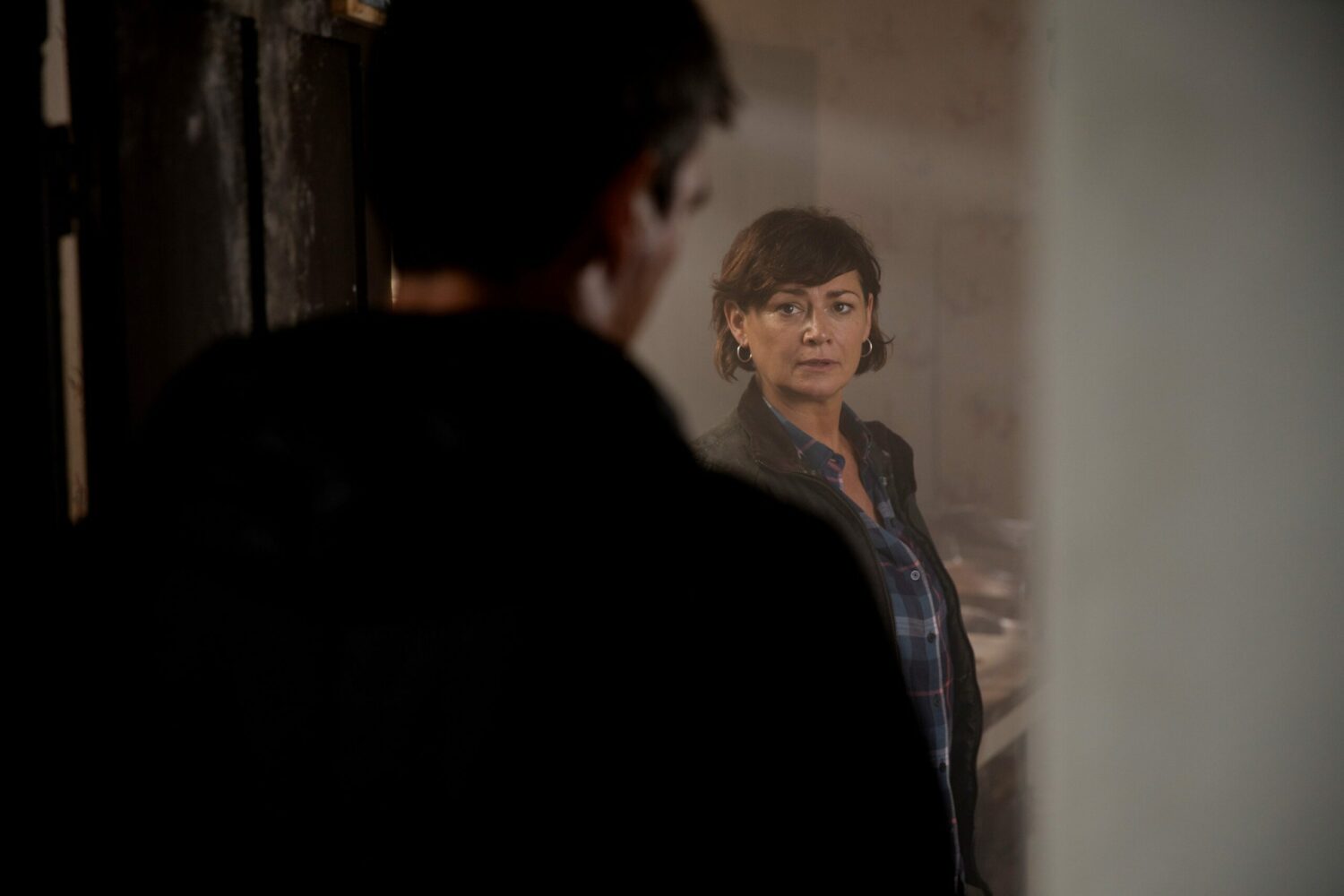 Moira looks at Cain with suspicion on Emmerdale