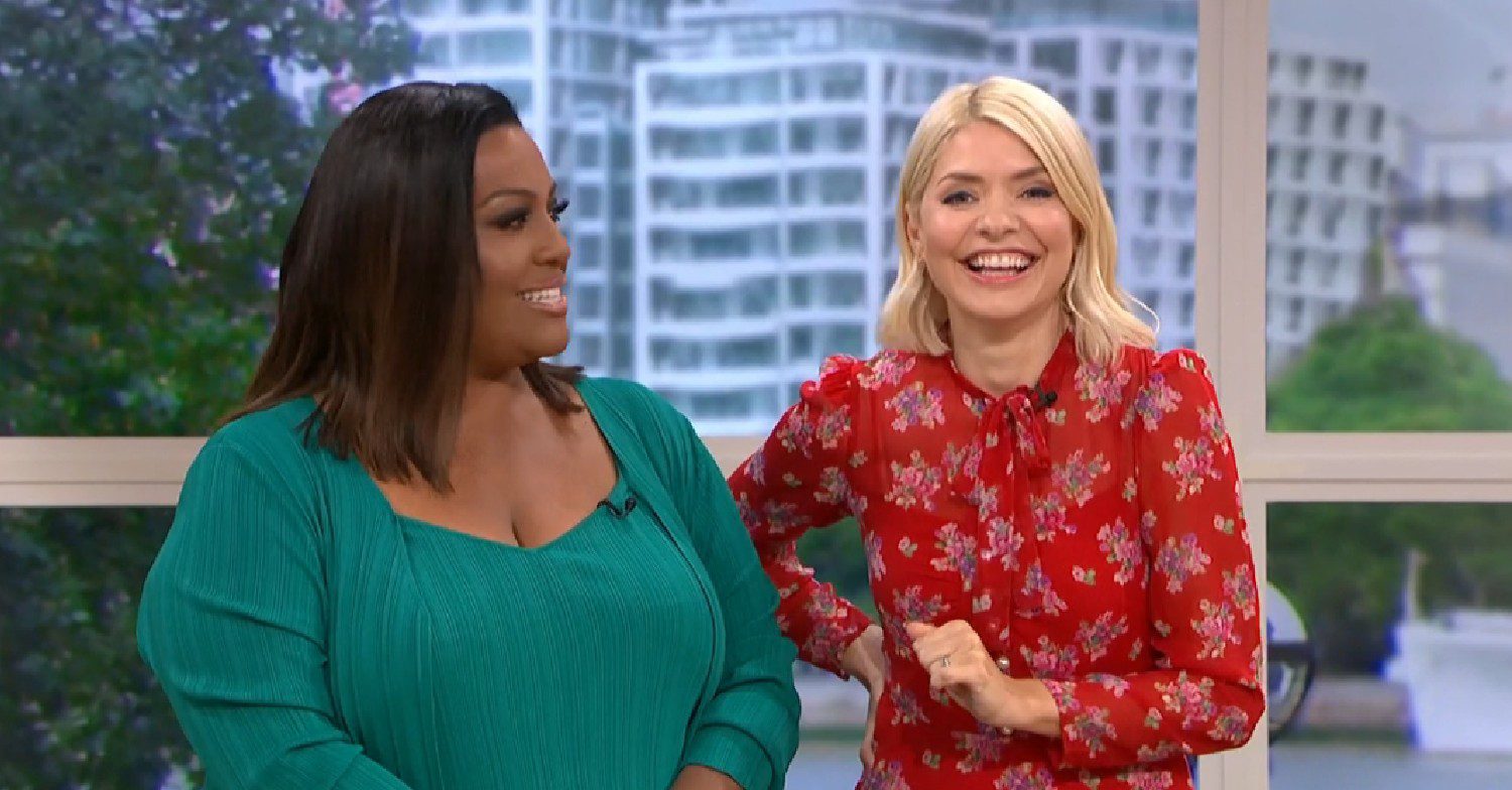 Holly Willoughby laughing alongside Alison Hammond on This Morning
