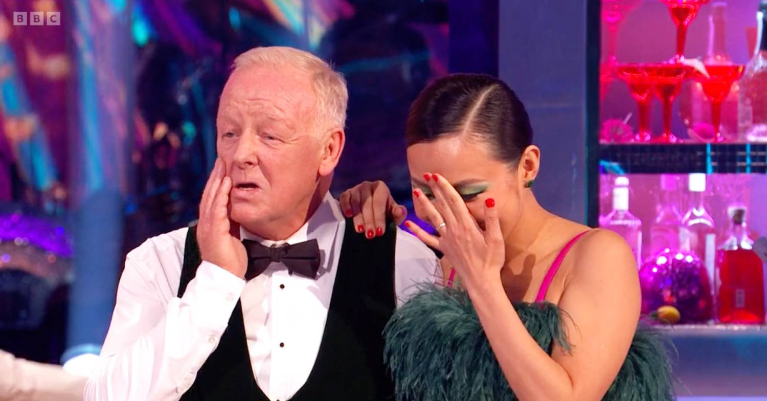 Nancy Xu looks down, her Strictly partner Les Dennis holds his face