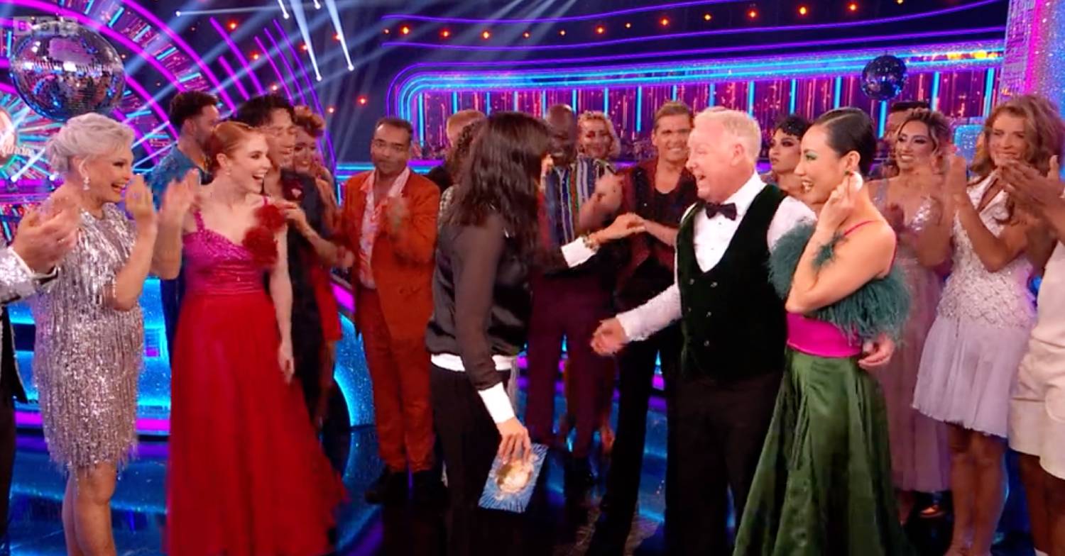 Nancy Xu holds a tissue to her neck on Strictly