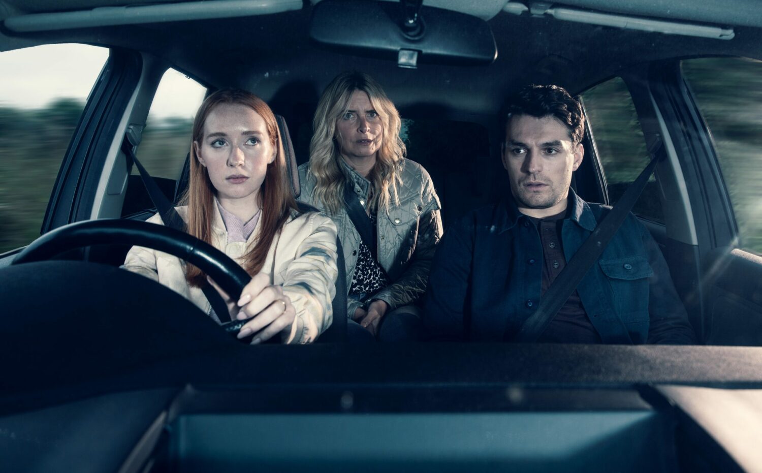 Chloe, Charity and Mack are in a car looking stressed
