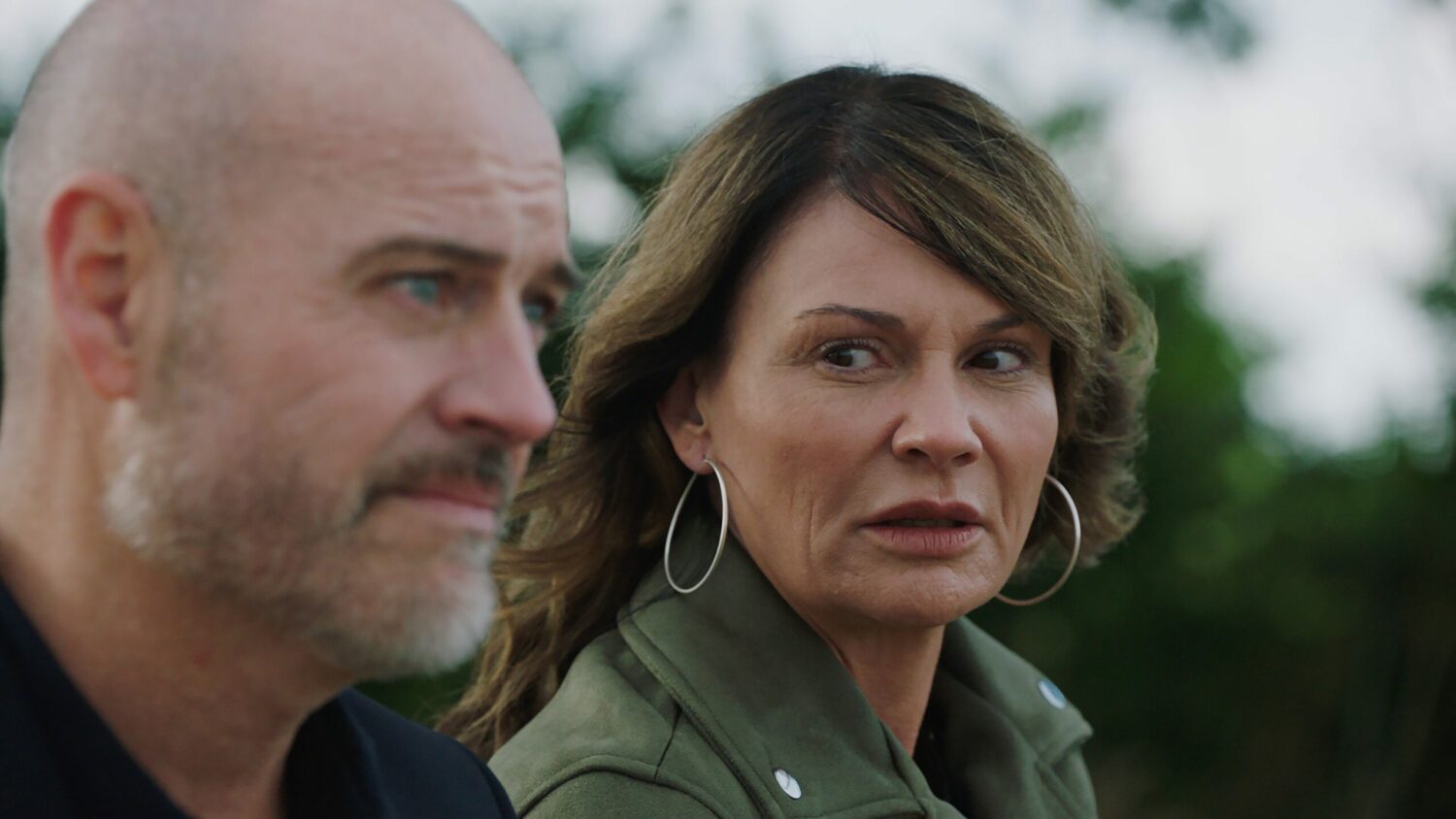 Chas looks scared as she watches Harry in Emmerdale