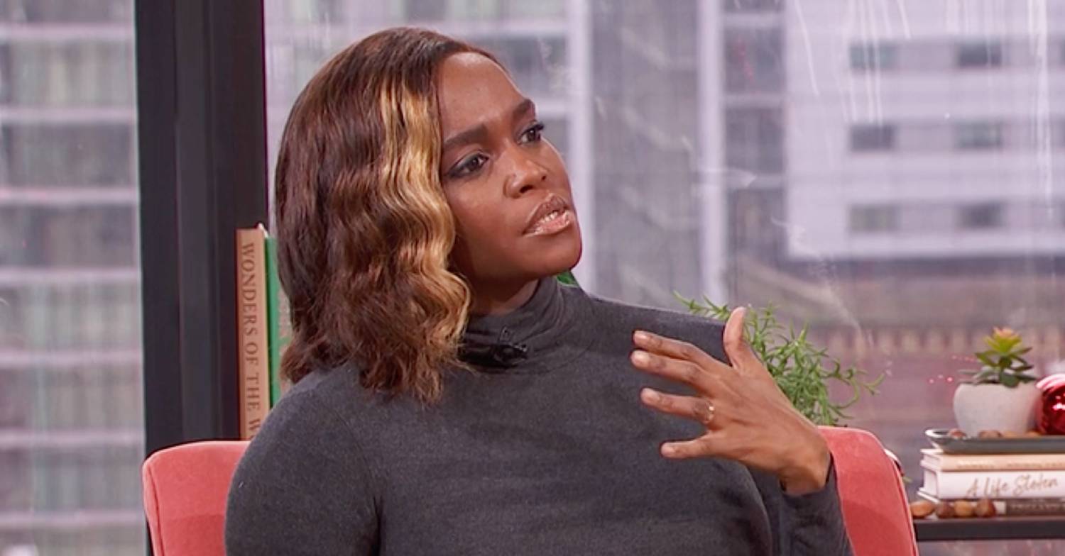 Oti Mabuse gestures with her hand as she speaks