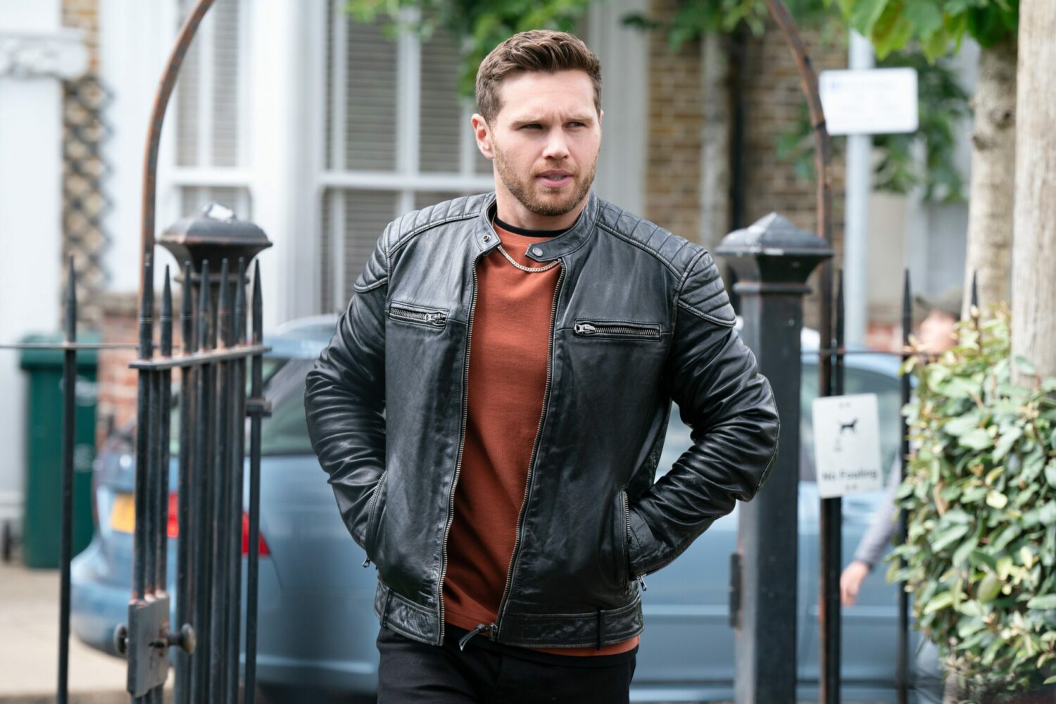 Suspicious Keanu Taylor watches on