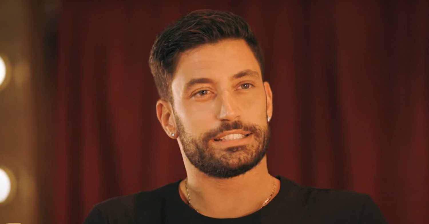 Giovanni Pernice speaking in an interview while on stage