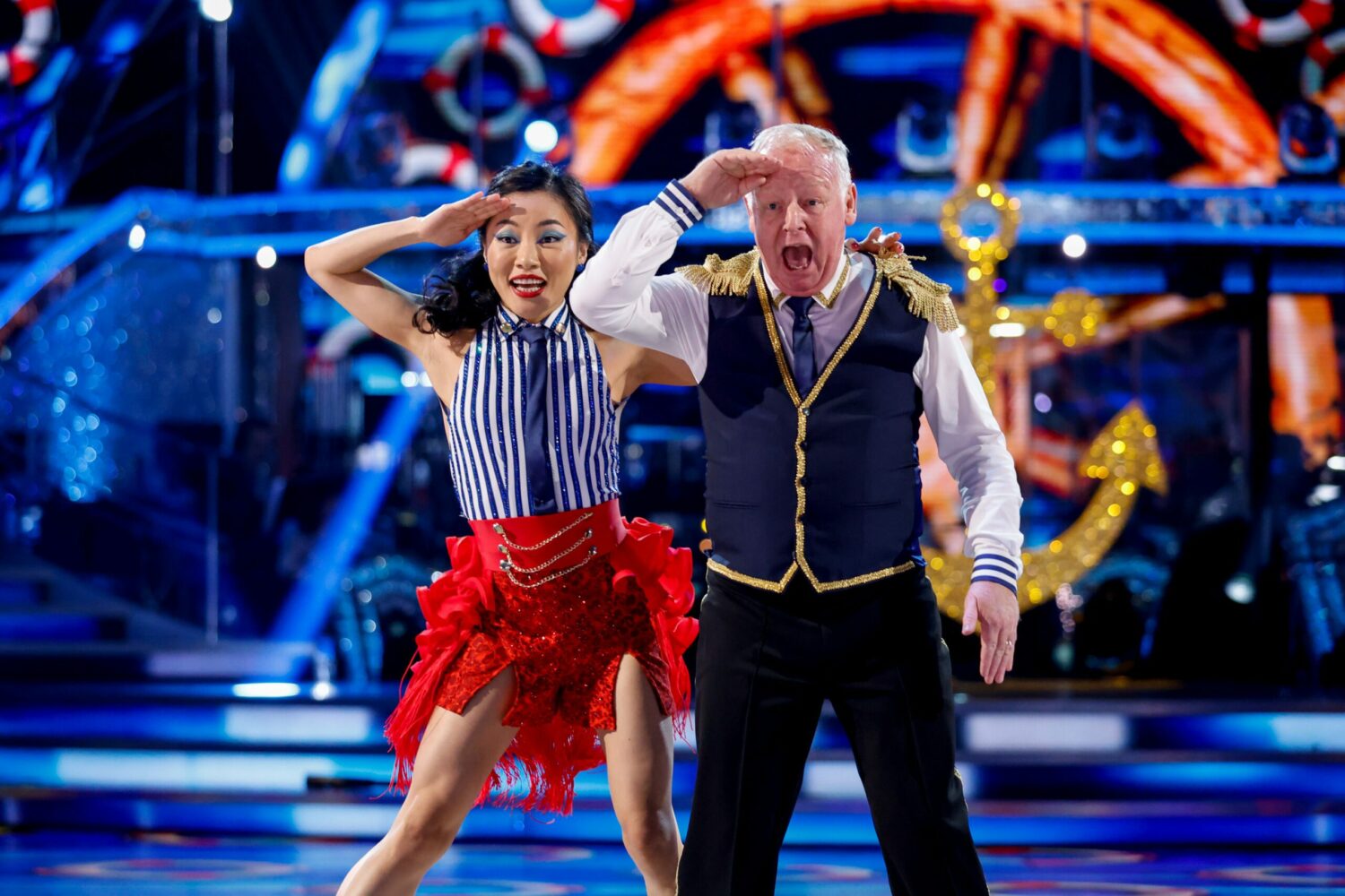 Nancy Xu and Les Dennis salute during their Strictly dance routine