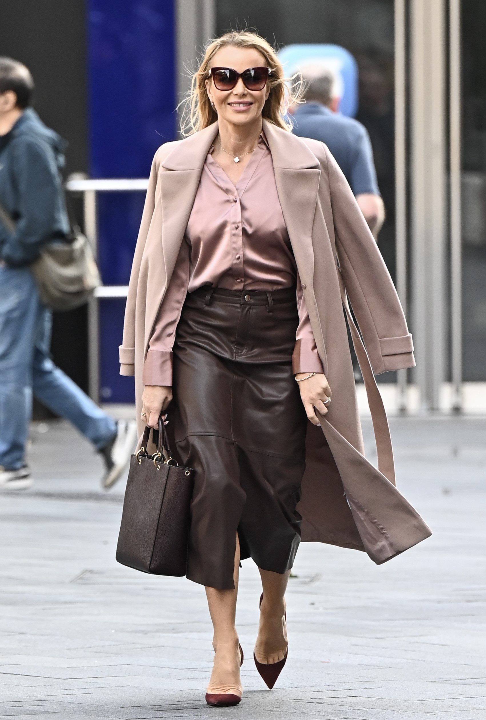 Amanda Holden smiling outside radio studios
