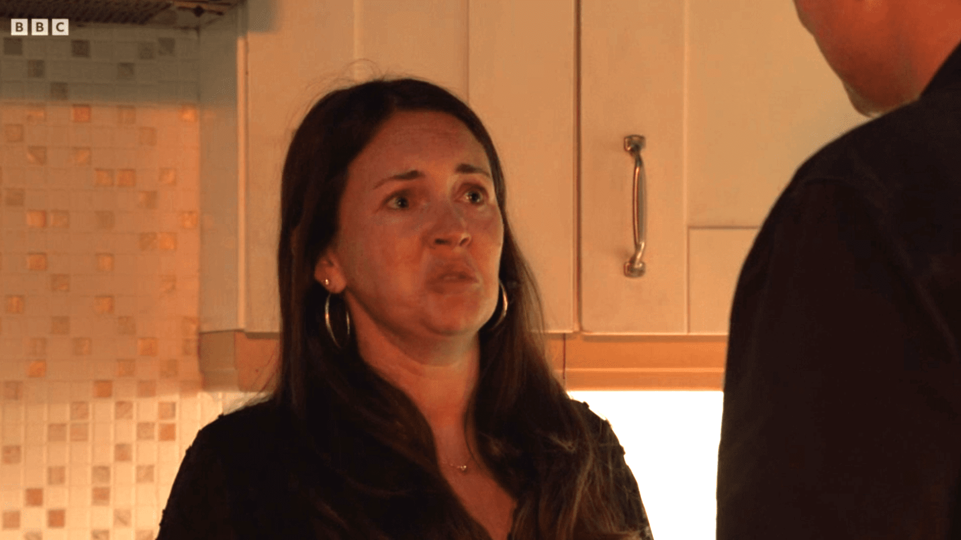 Stacey Slater looks terrified as Theo looms over her in EastEnders