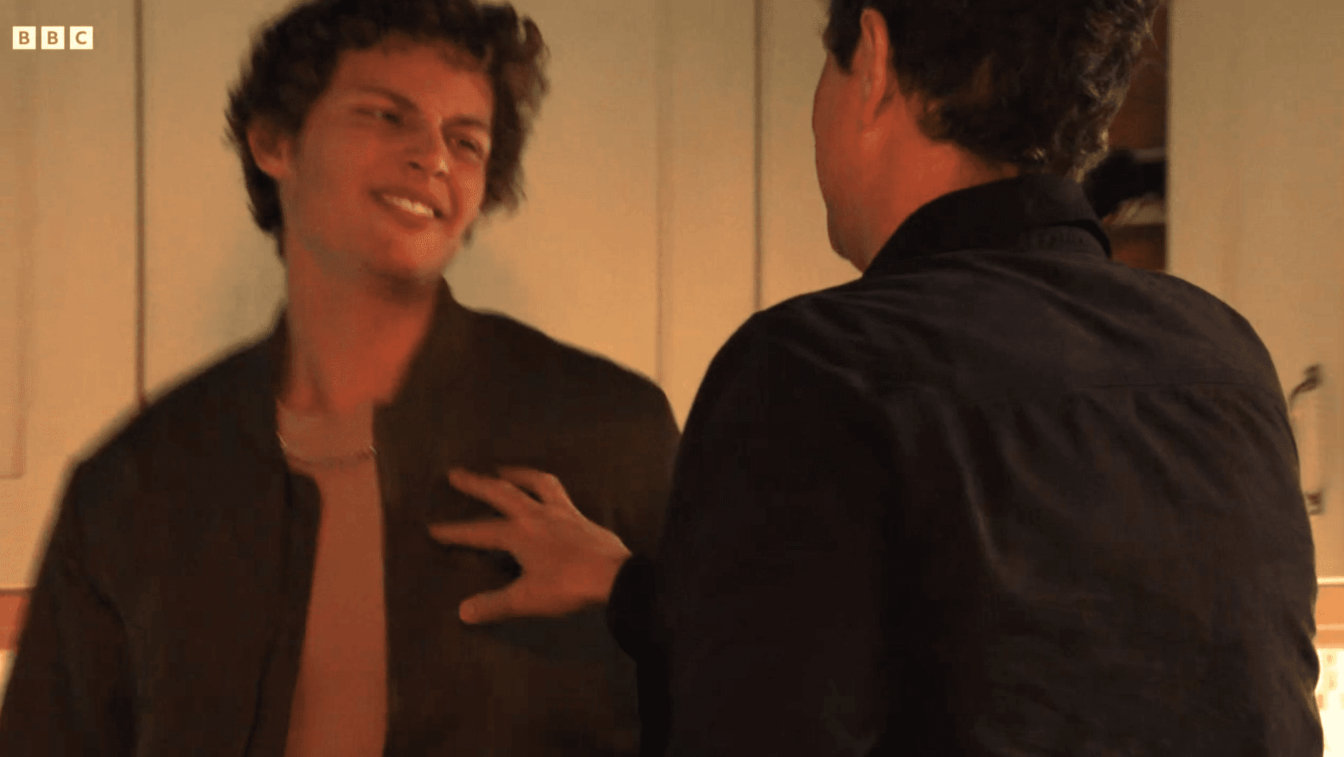 Freddie Slater grimaces as he prepares to punch Theo Hawthorne who has his hand on his chest