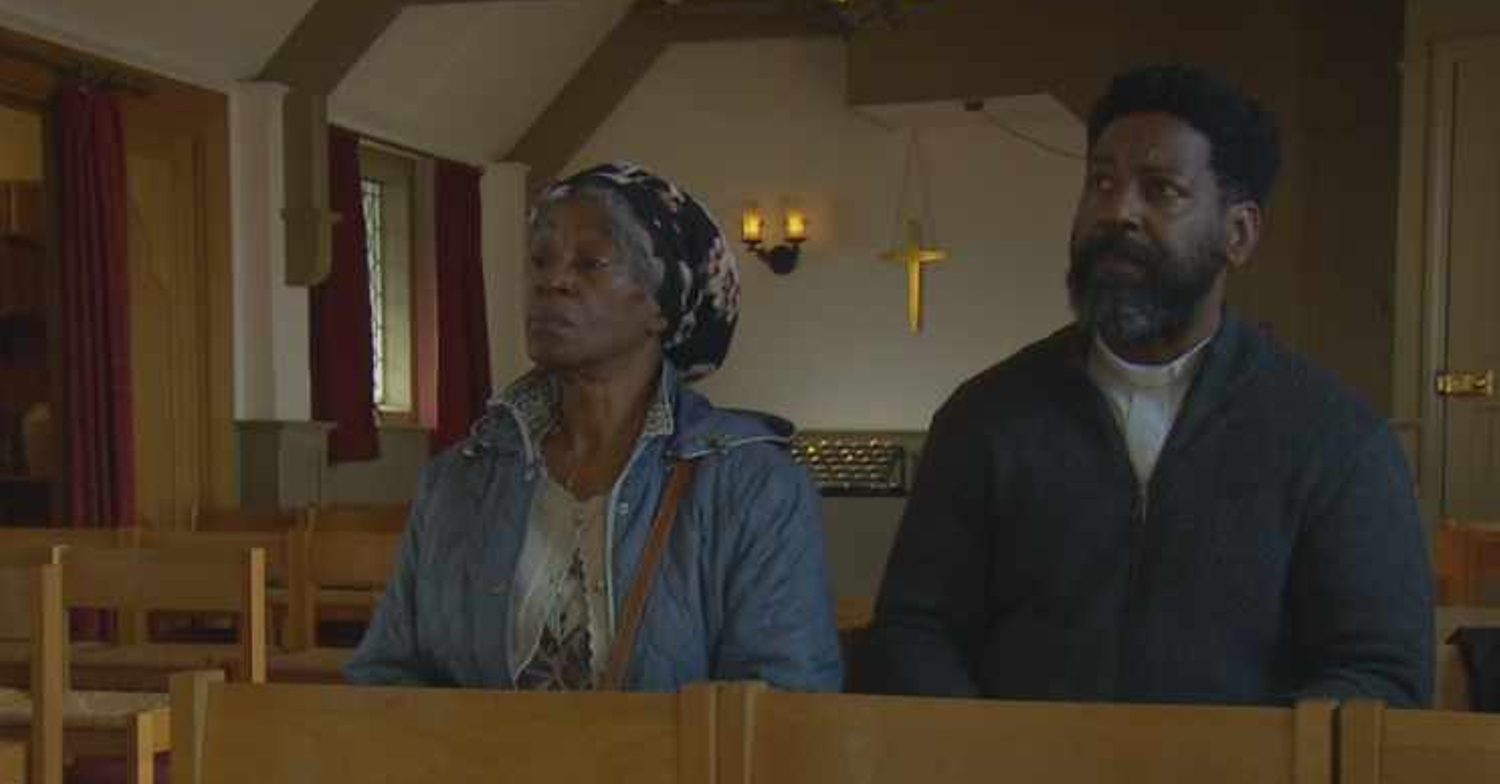Emmerdale's Charles and Claudette are sitting in church