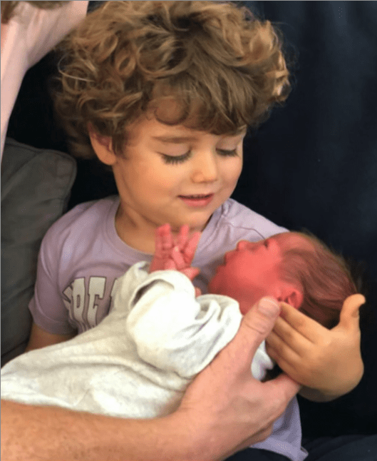 Dr Sara's little boy Harris with his new sister