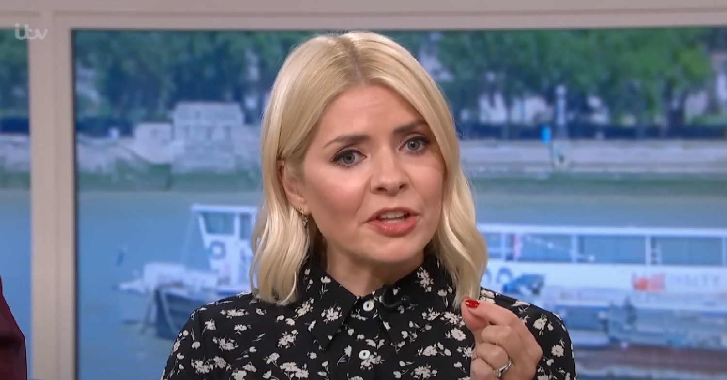 Holly Willoughby speaking and looking serious on This Morning
