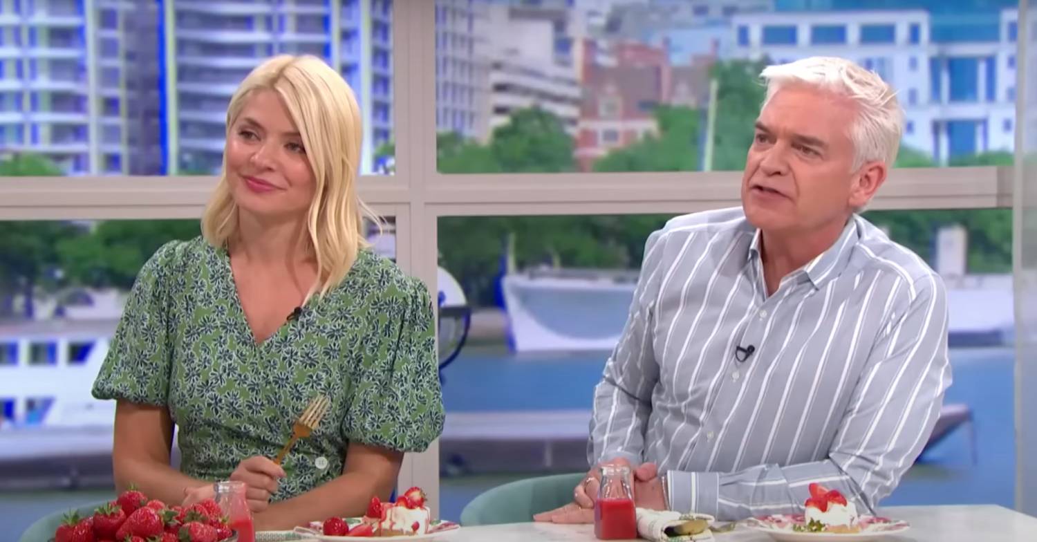 Holly Willoughby sits next to Phillip Schofield on This Morning