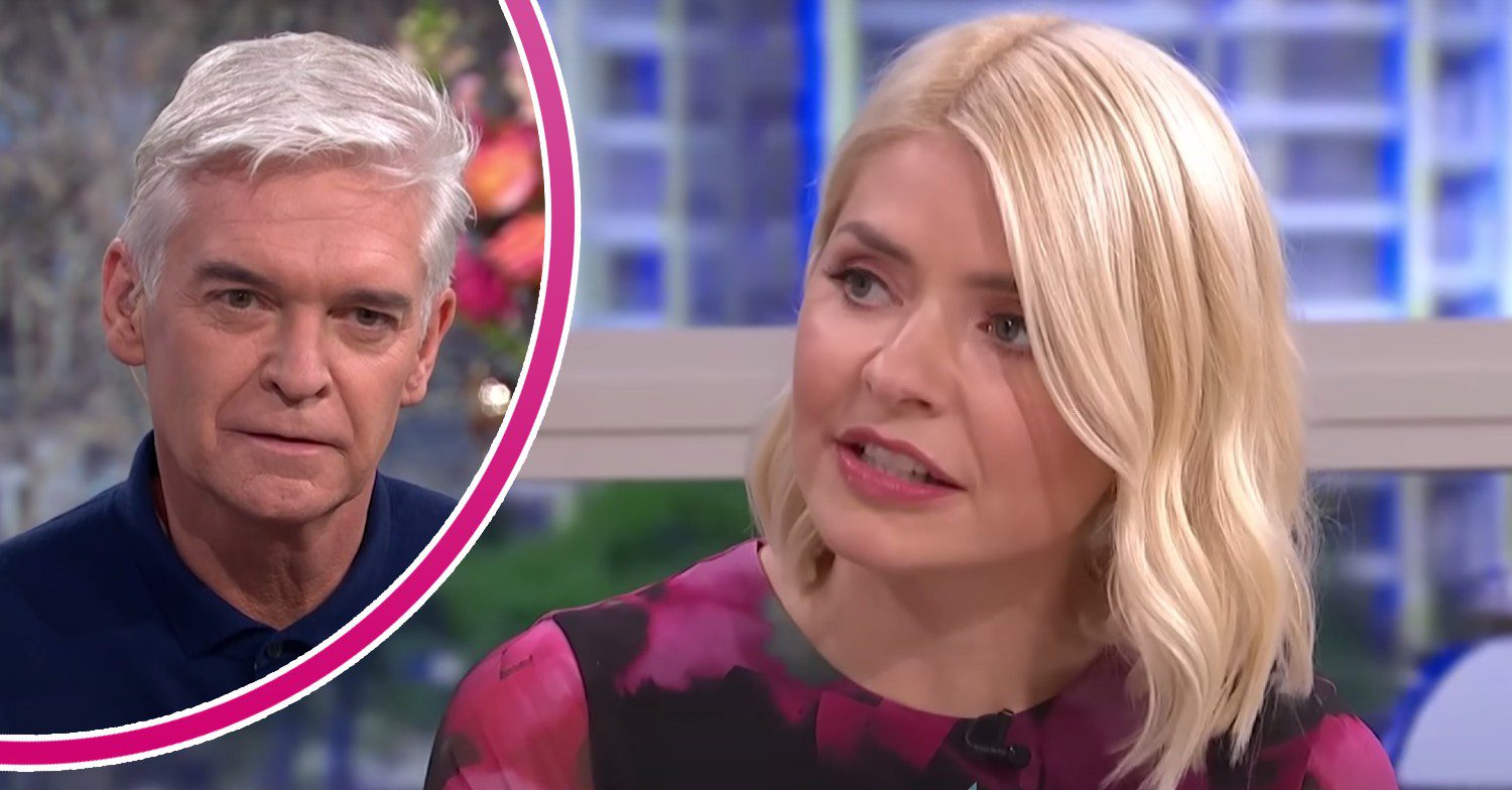 Holly Willoughby looks to her side, Phillip Schofield looks into the middle distance