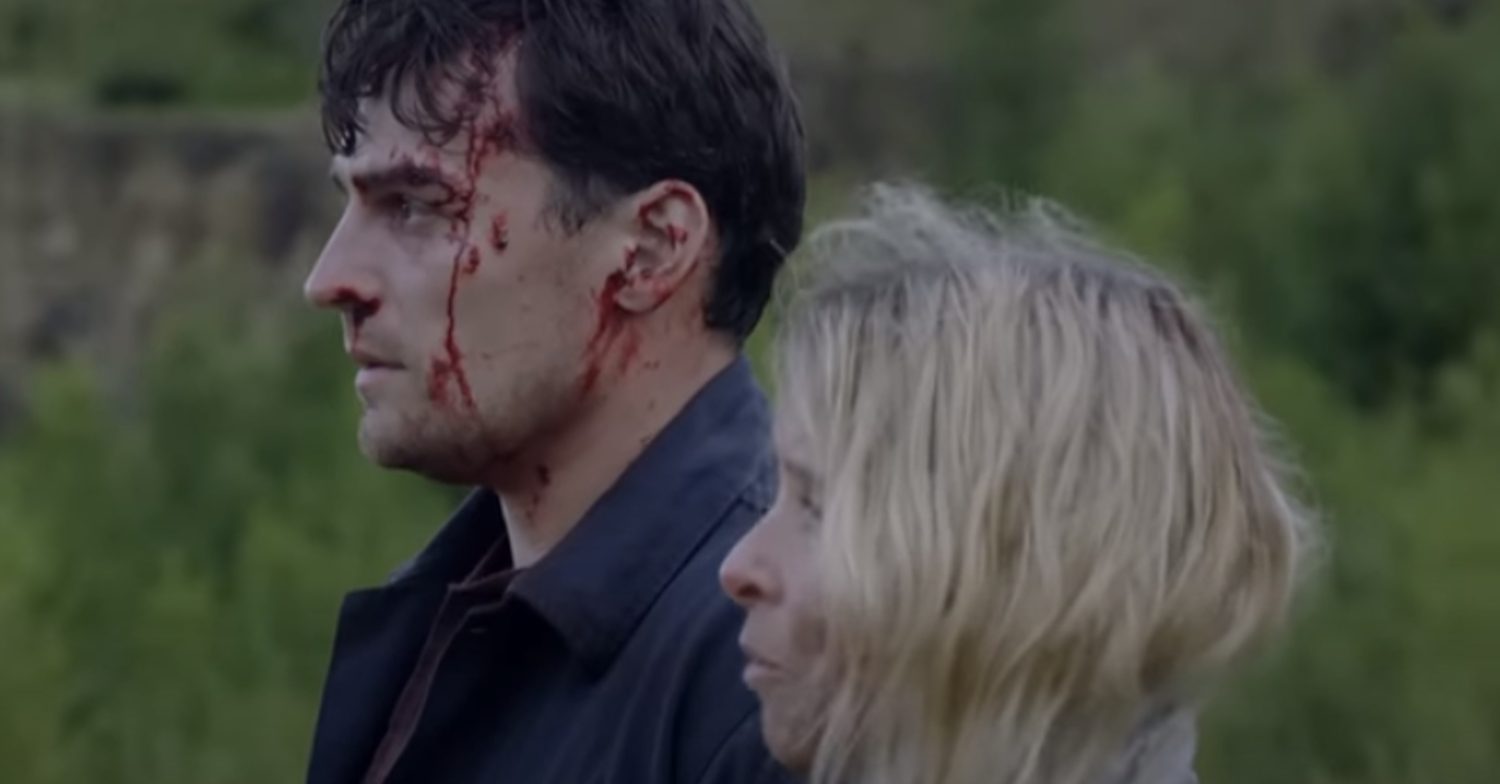 Emmerdale's Mack is bleeding as he stands next to Charity