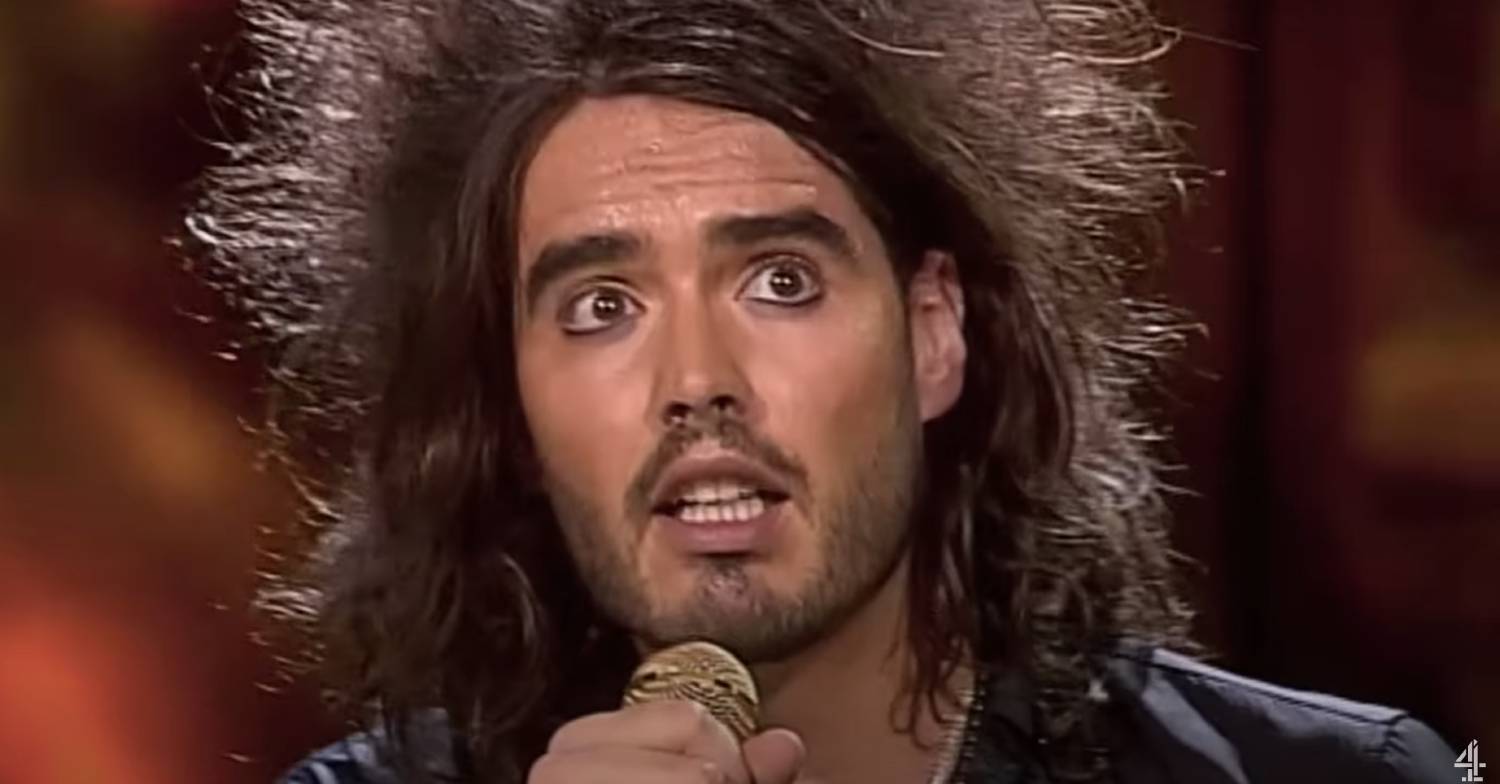 Russell Brand performs
