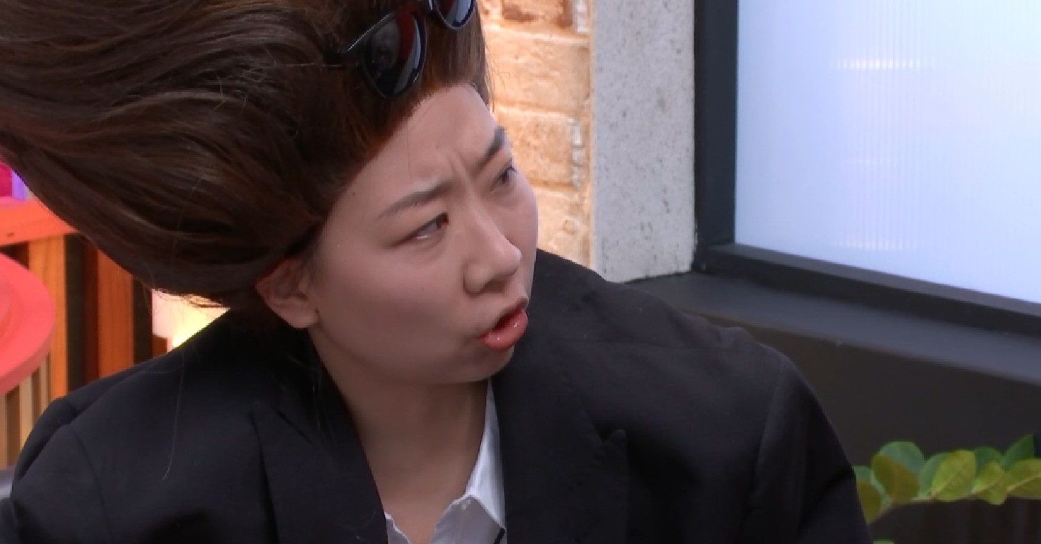 Yinrun wearing a wig on Big Brother