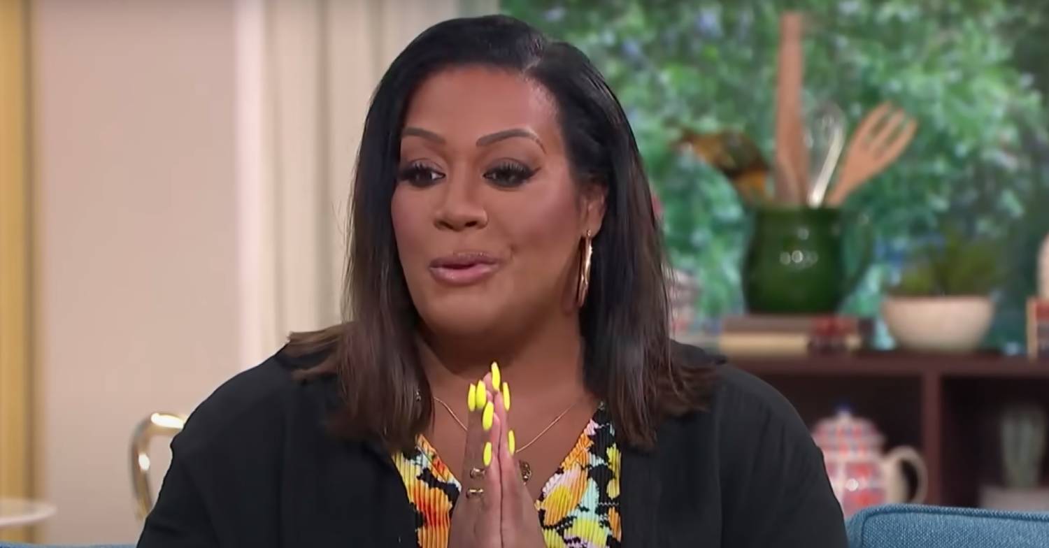 Alison Hammond puts her hands together