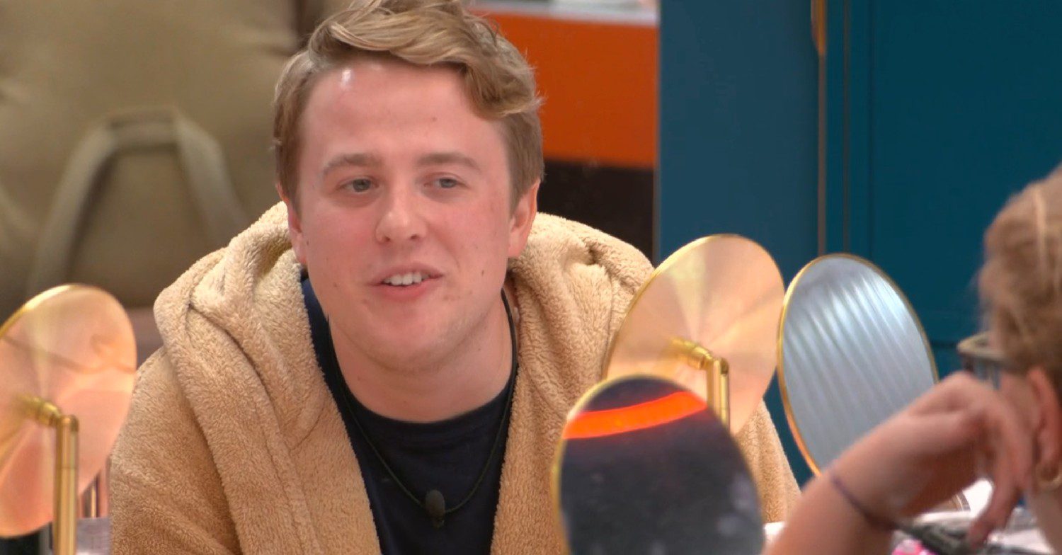 Henry talking to Kerry in the Big Brother house