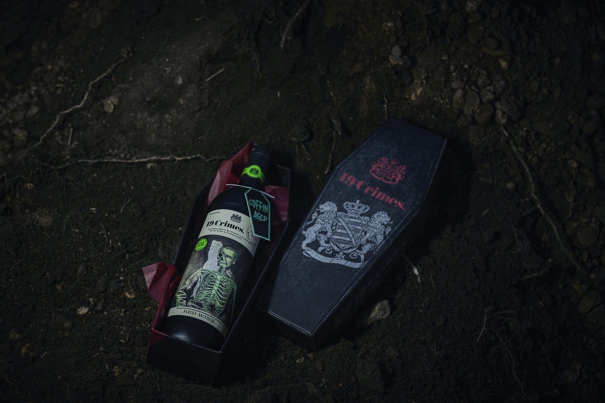 19 Crimes wine bottle in a grave 