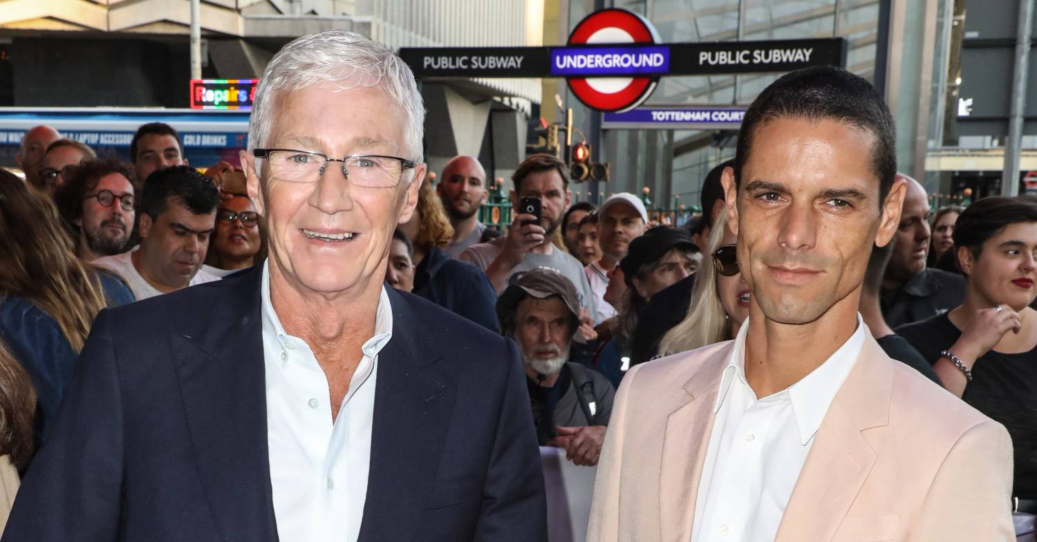 Paul O'Grady and his husband Andre Portasio poses for the camera